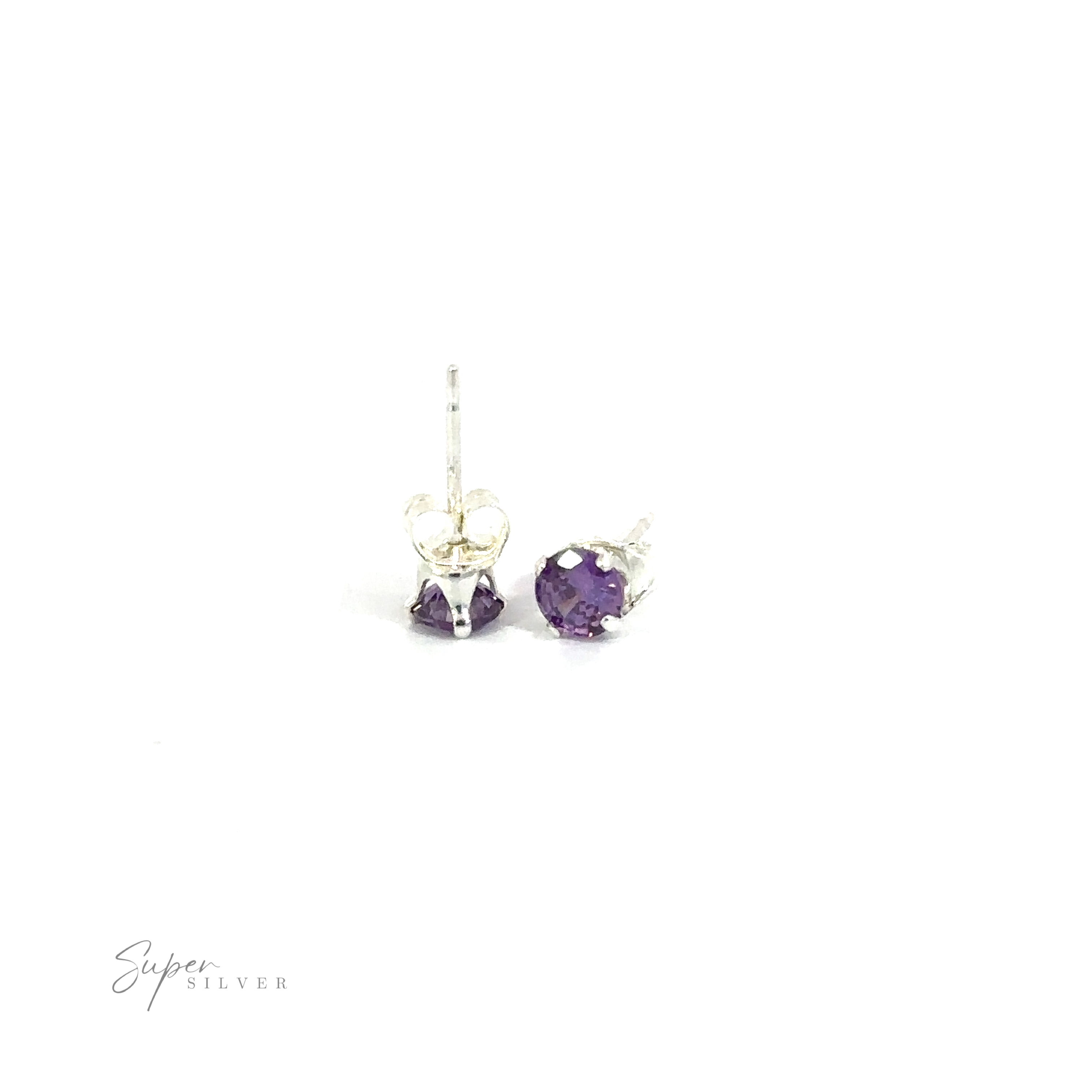 A pair of Round CZ Studs with purple cubic zirconia accents on a white background.