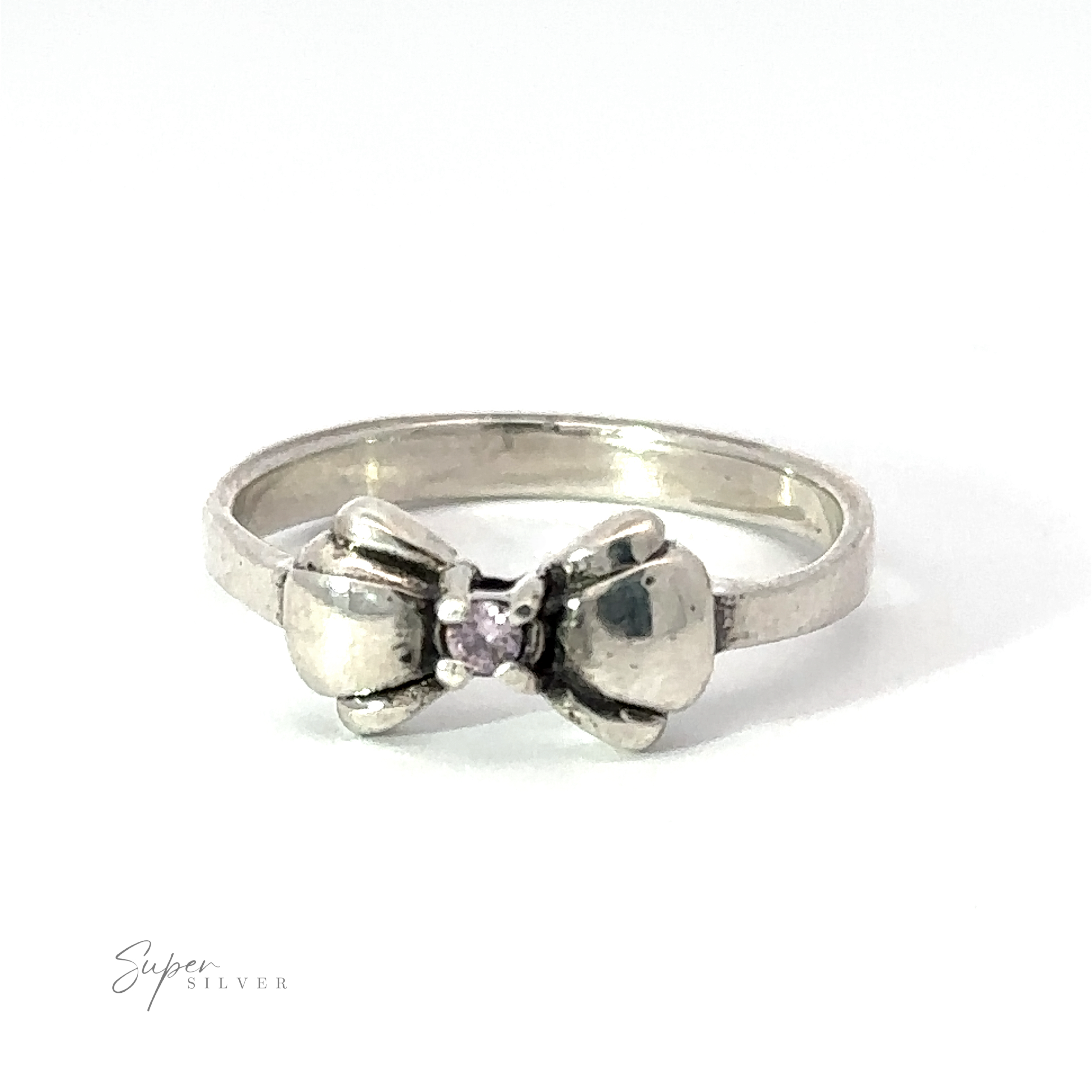 A sterling silver Adorable Cubic Zirconia Bow Ring featuring a small central black cubic zirconia, designed with two bow-like shapes on either side of the stone. Text in the corner reads "Super Silver.