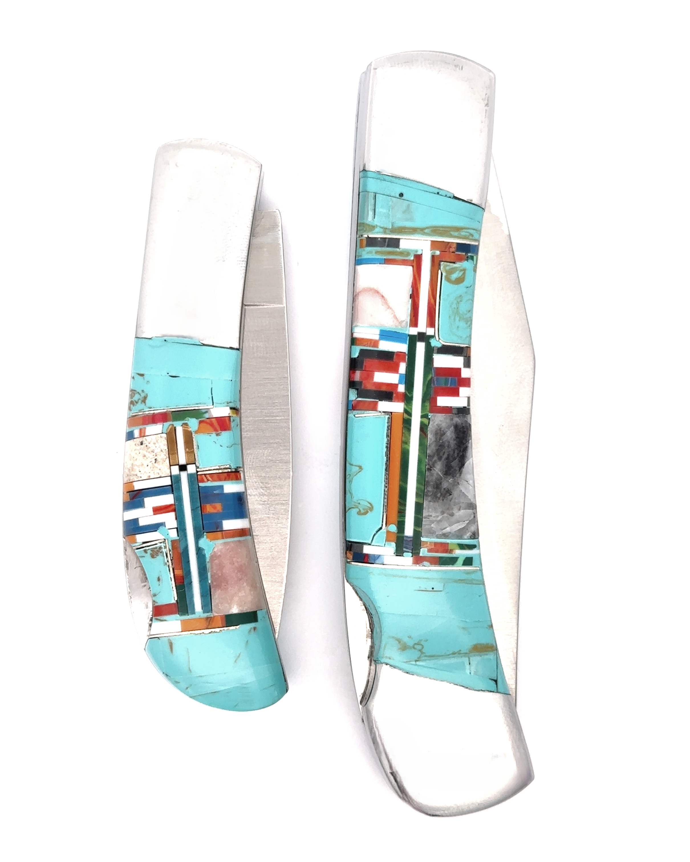 Two Intricate Inlay Southwest Pocket knives display detailed turquoise, red, blue, and white inlaid designs on their handles, capturing a unique Southwest style against a white background. One knife is open while the other remains closed.
