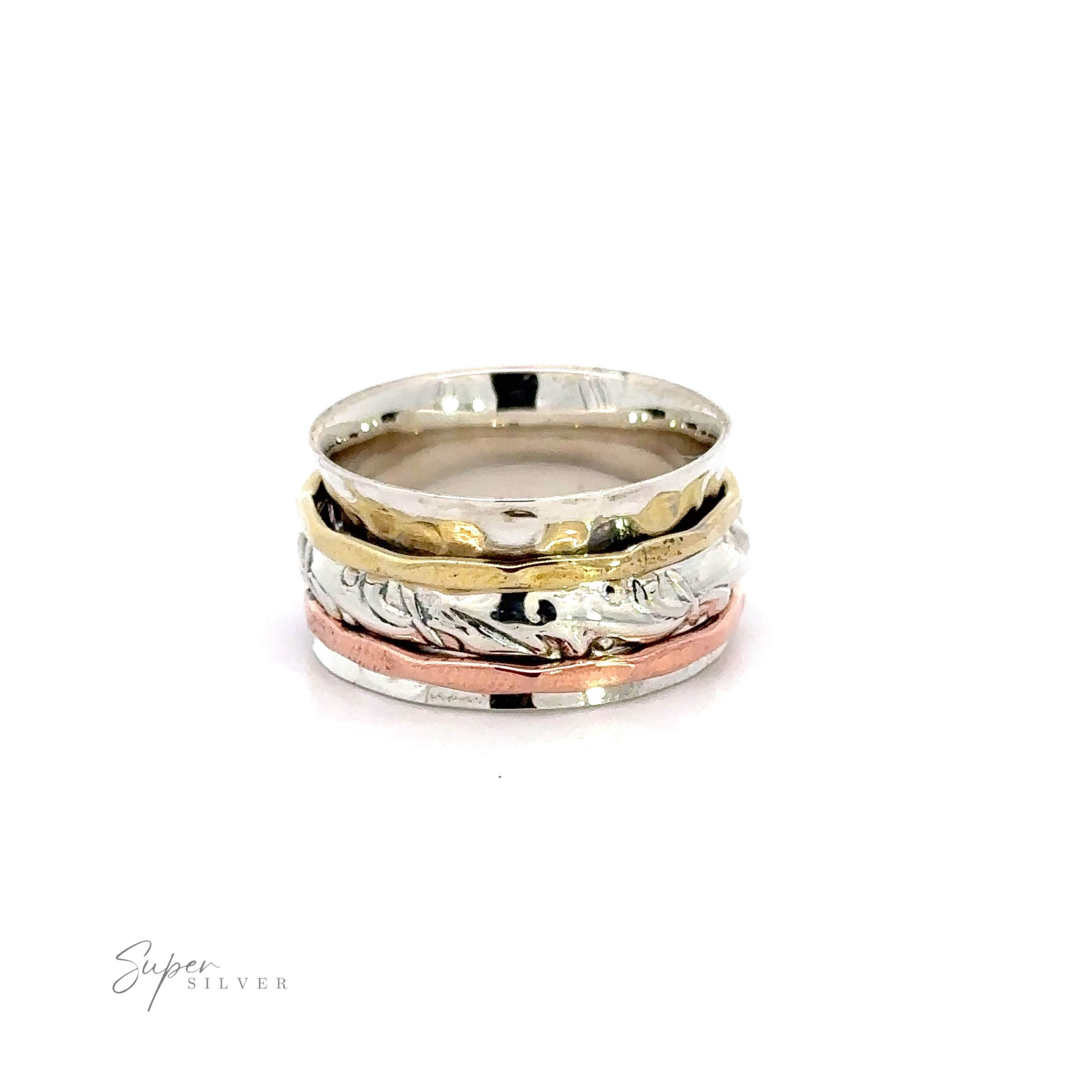 A Handmade Spinner Ring with a Filigree Pattern Band with a filigree pattern on a white background.