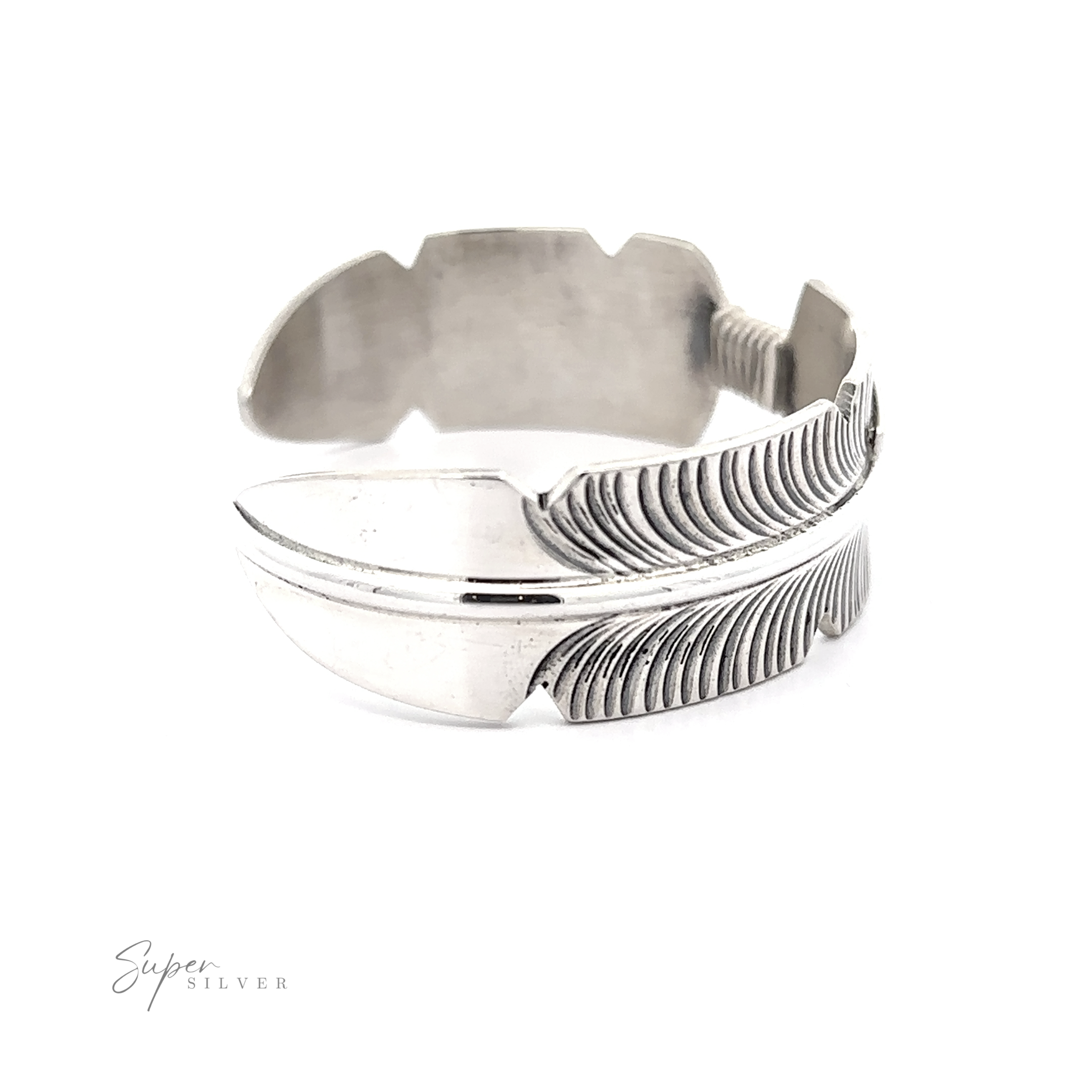 Native American Silver Feather Cuff Bracelet, showcasing Southwest craftsmanship, on a white background.