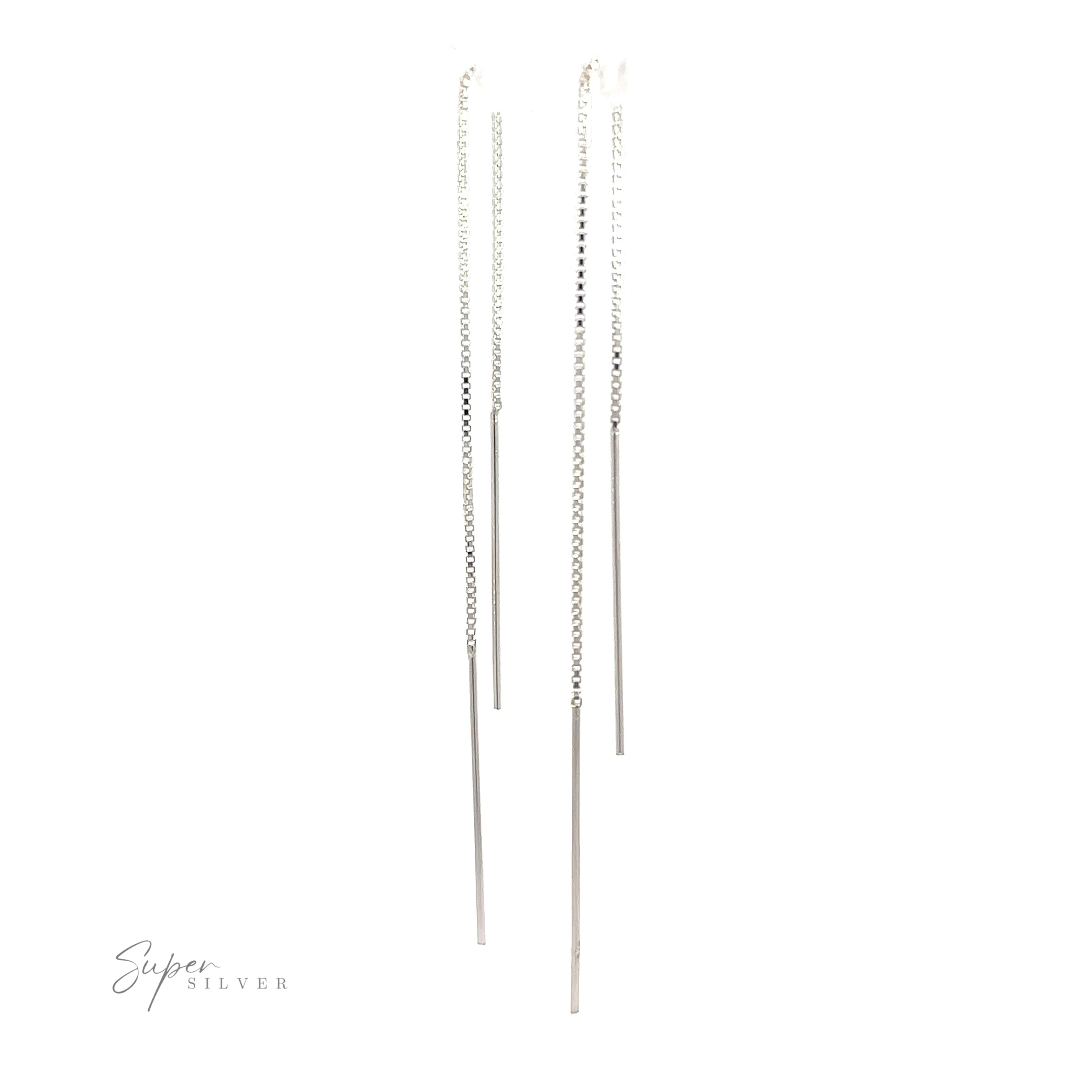 Minimalist and sleek, these Simple Silver Wire Threader earrings are elegantly displayed on a white background.