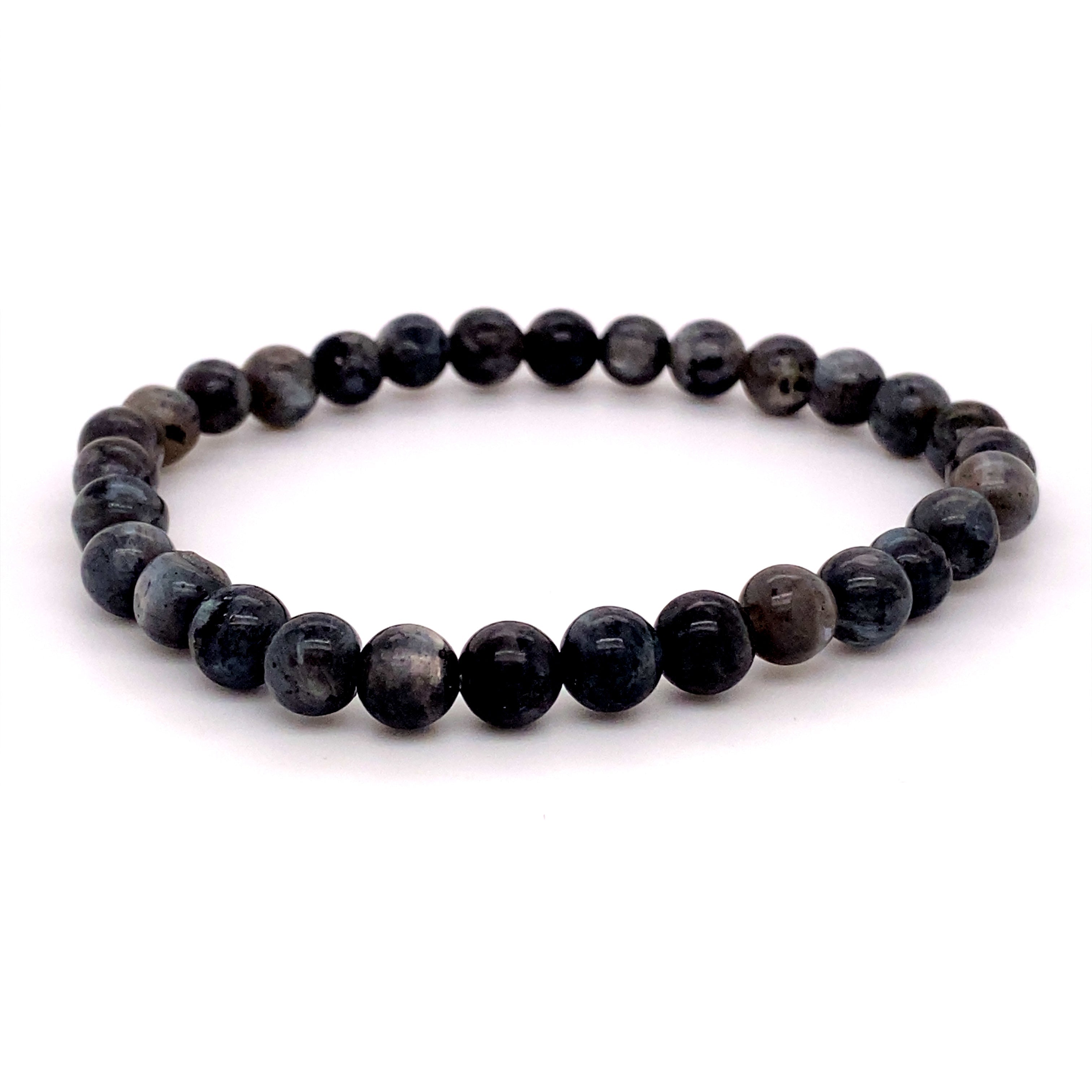 A healing stone bracelet made of round, grey 4mm Beaded Stone Bracelets beads on a white background.