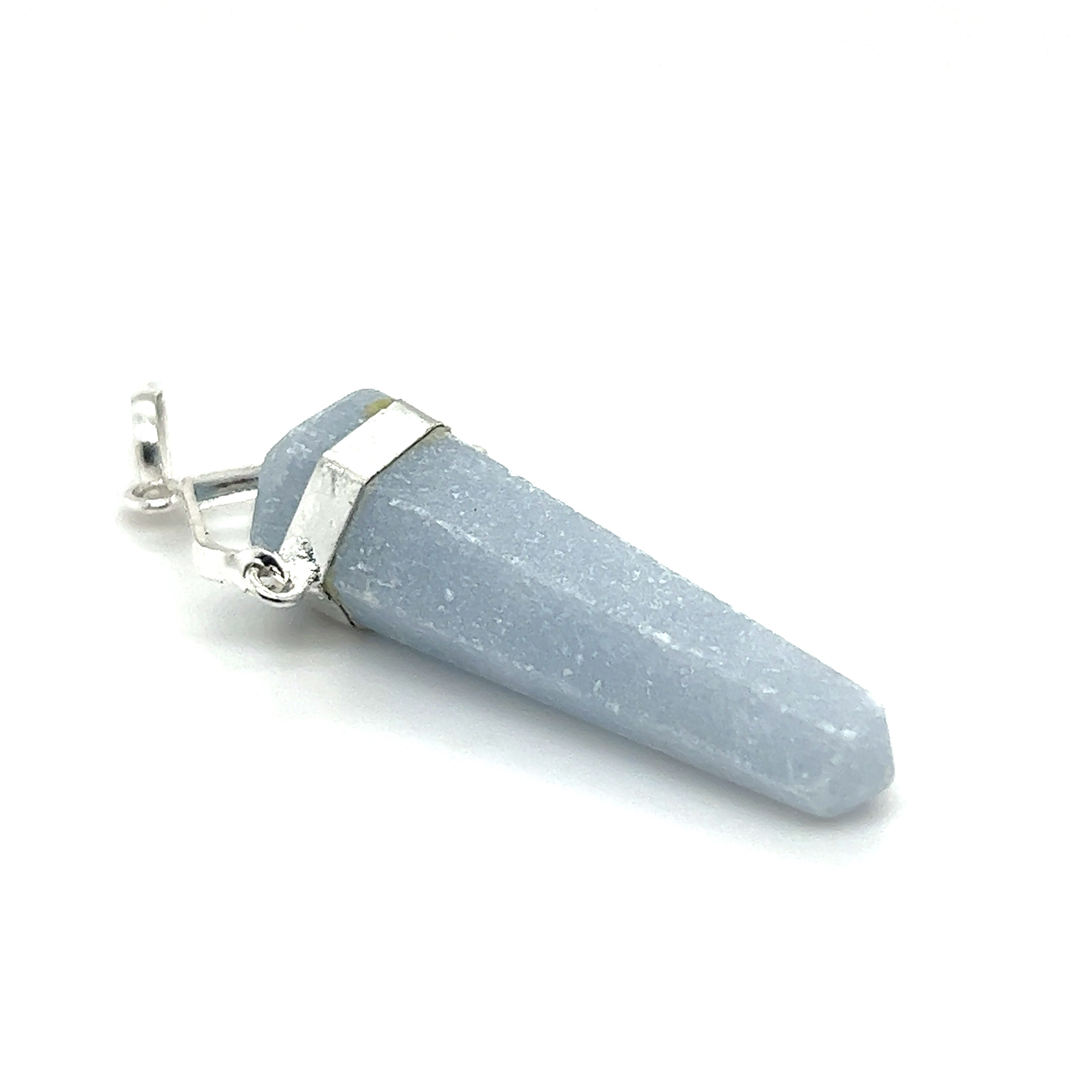 A silver pendant with a blue druzy stone, set in a silver-plated setting. becomes:
A Super Silver Raw Stone Swivel Pendant, with a blue druzy stone, set in a silver-plated setting.