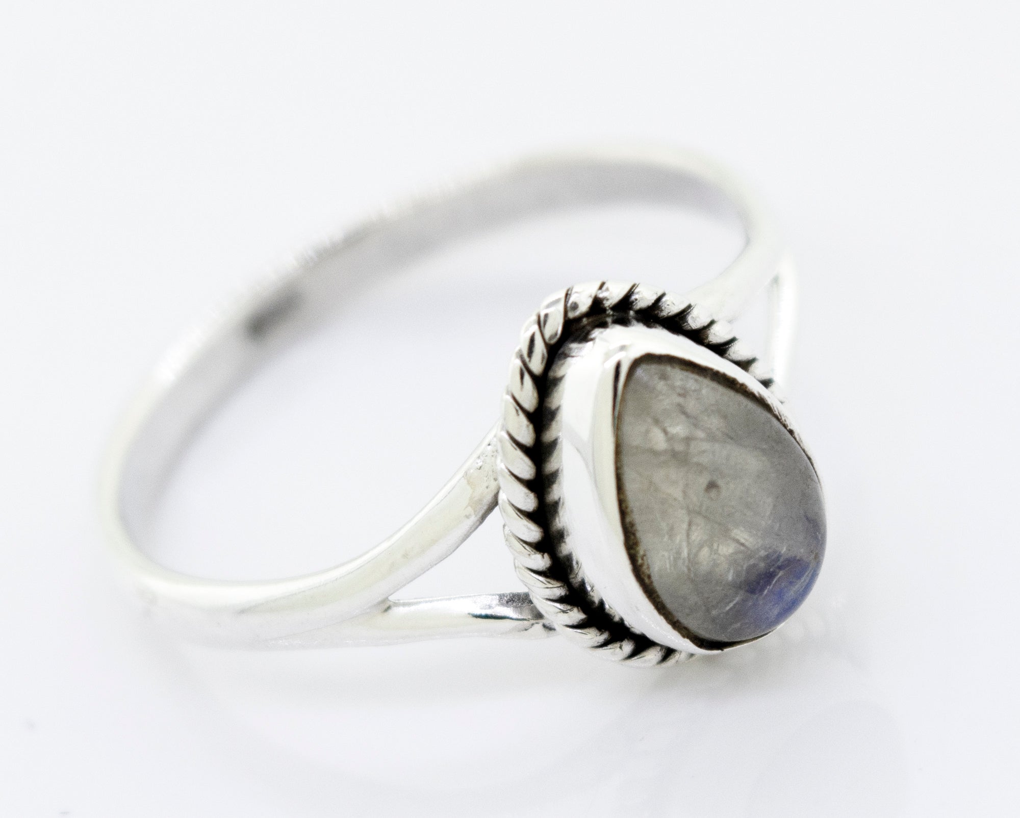 Vibrant Teardrop Shape Stone Ring with a teardrop-shaped moonstone set in a detailed bezel, displayed against a white background.