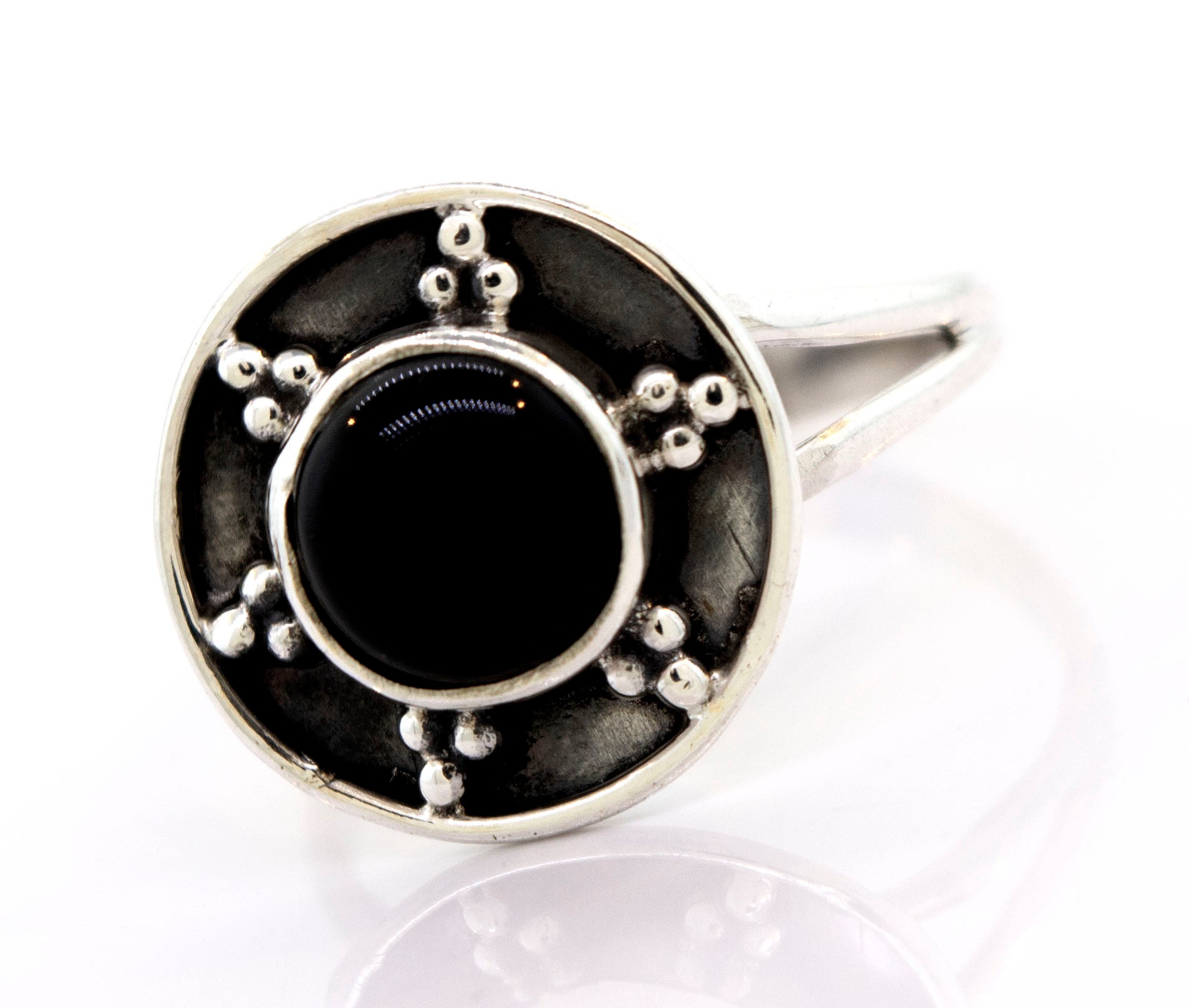 Gemstone Ring With Unique Oxidized Design with a round black stone centerpiece, surrounded by decorative silver bead details. The band, made of oxidized silver, is simple and polished, adding a timeless touch to this exquisite piece of gemstone jewelry.
