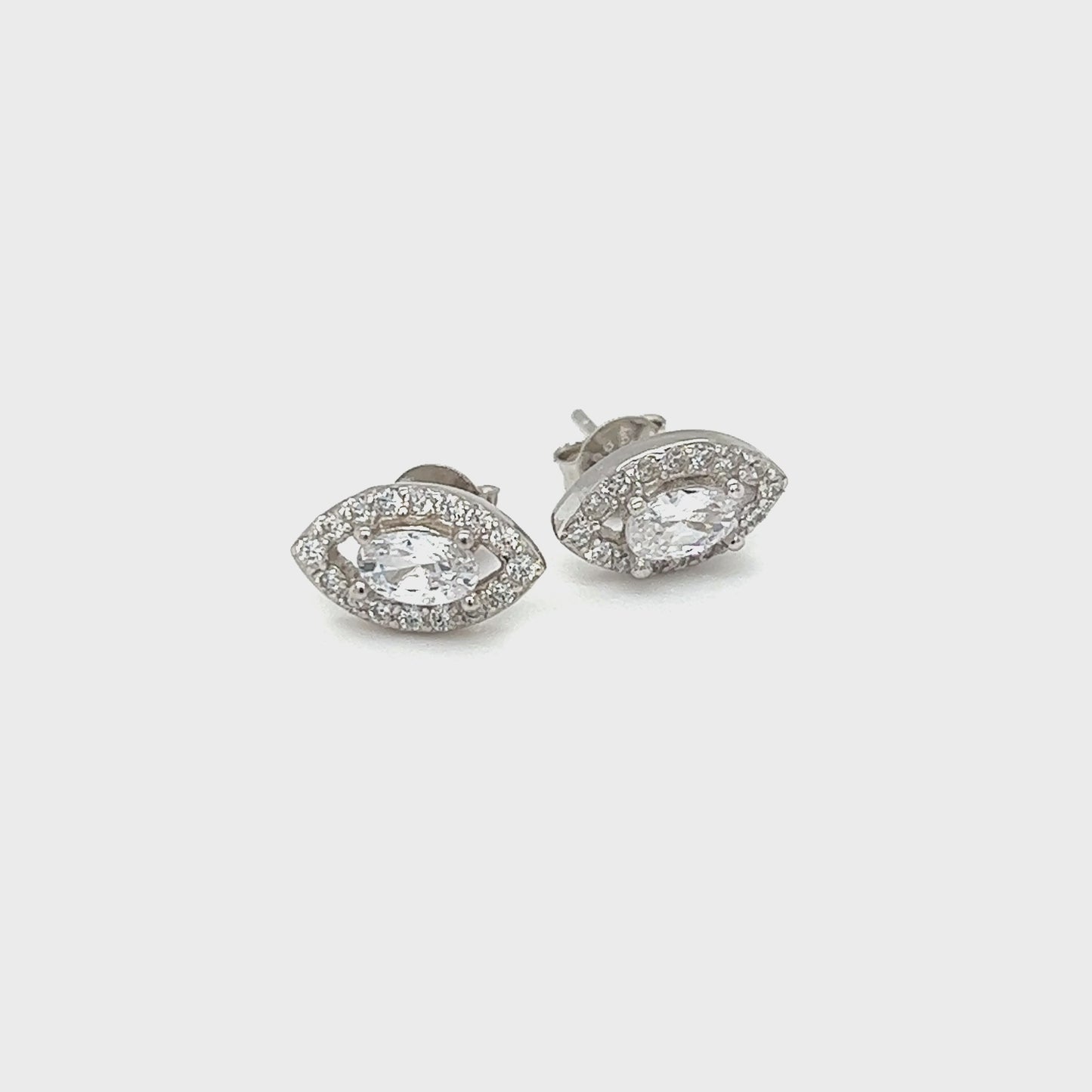 
                  
                    Load and play video in Gallery viewer, Marquise Shaped Cubic Zirconia Studs
                  
                