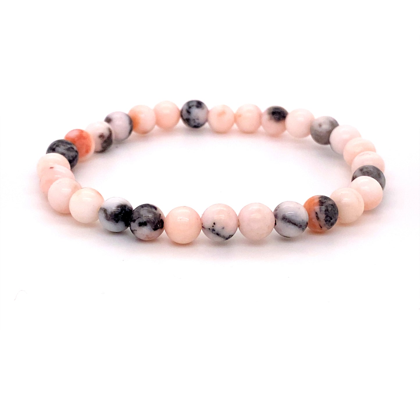 
                  
                    A 4mm Beaded Stone Bracelets made of alternating pink and black marbled beads, featuring Red Agate and Rose Quartz on a plain white background.
                  
                