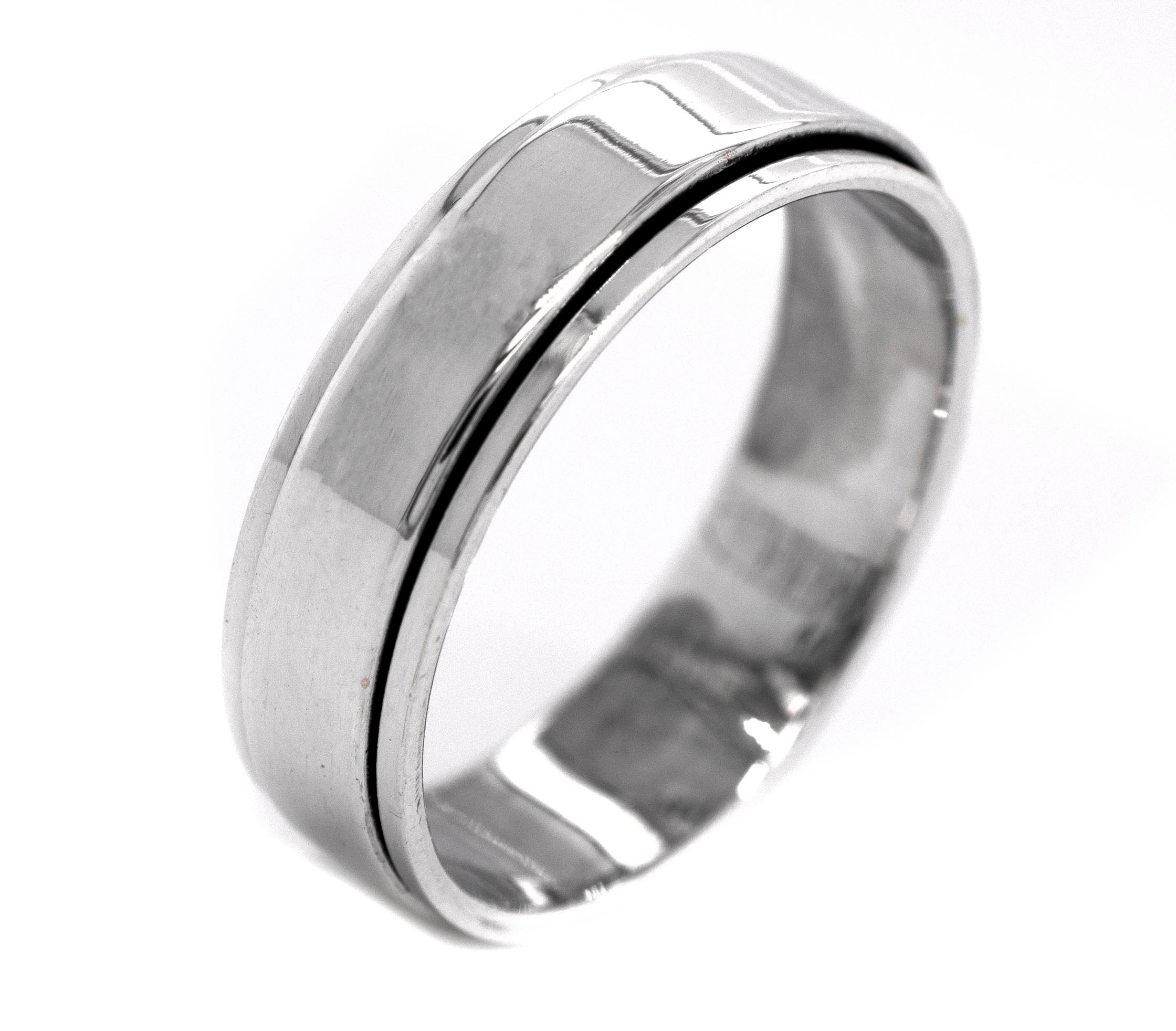 The Simple Silver Spinner Ring features a plain, polished sterling silver design with a slightly raised central band, shown against a white background.