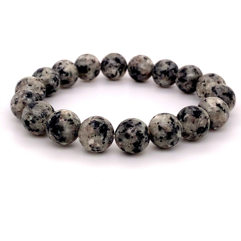 
                  
                    4mm Beaded Stone Bracelets made of speckled gray and black beads, displayed on a white background, featuring healing stones like Red Agate.
                  
                