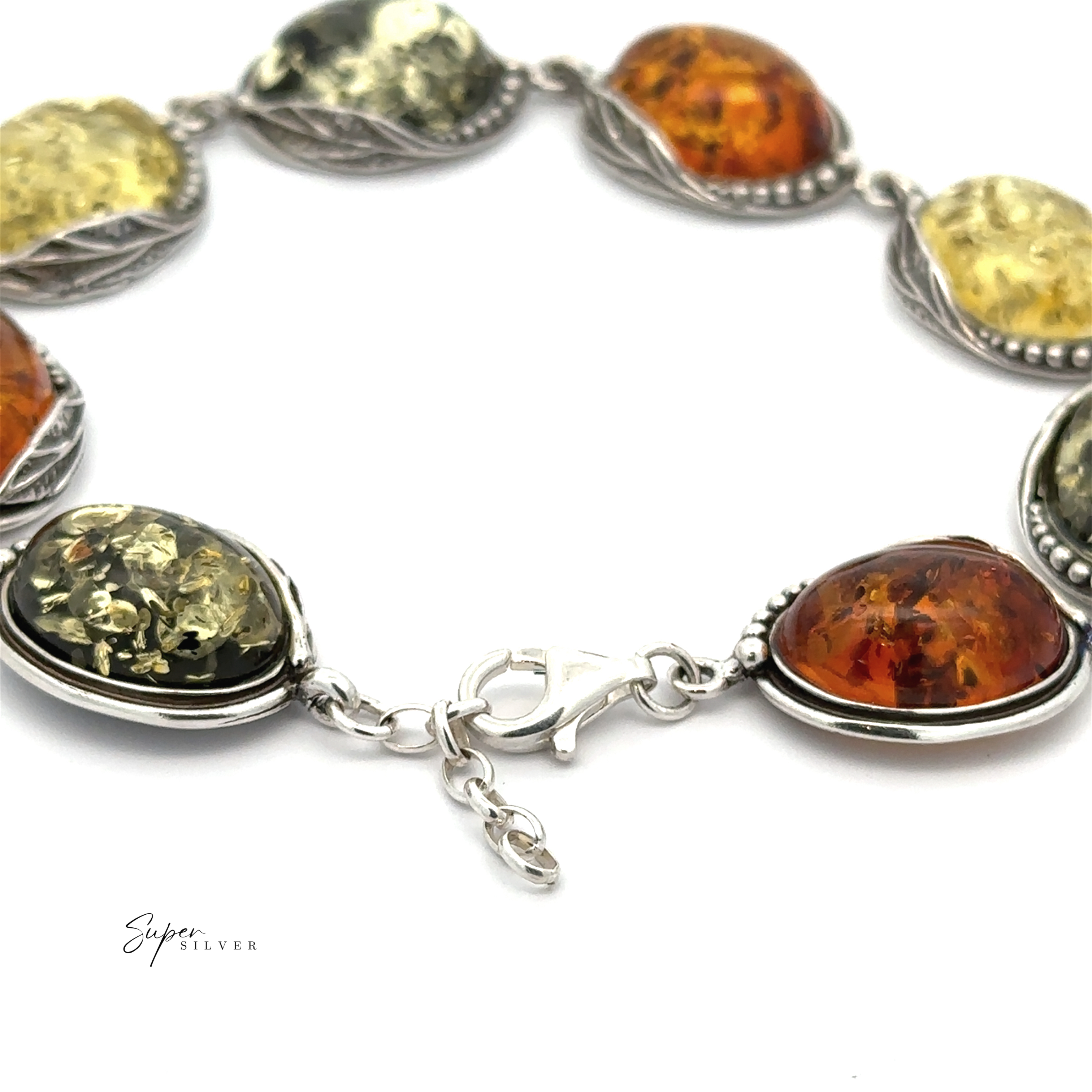 The Oval Amber Link Bracelet With Leaf Detail showcases classic elegance with its silver design, featuring oval-shaped Baltic amber stones in assorted colors and secured with a lobster clasp.