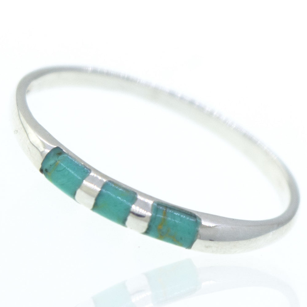 A Striped Turquoise Ring crafted from .925 silver.