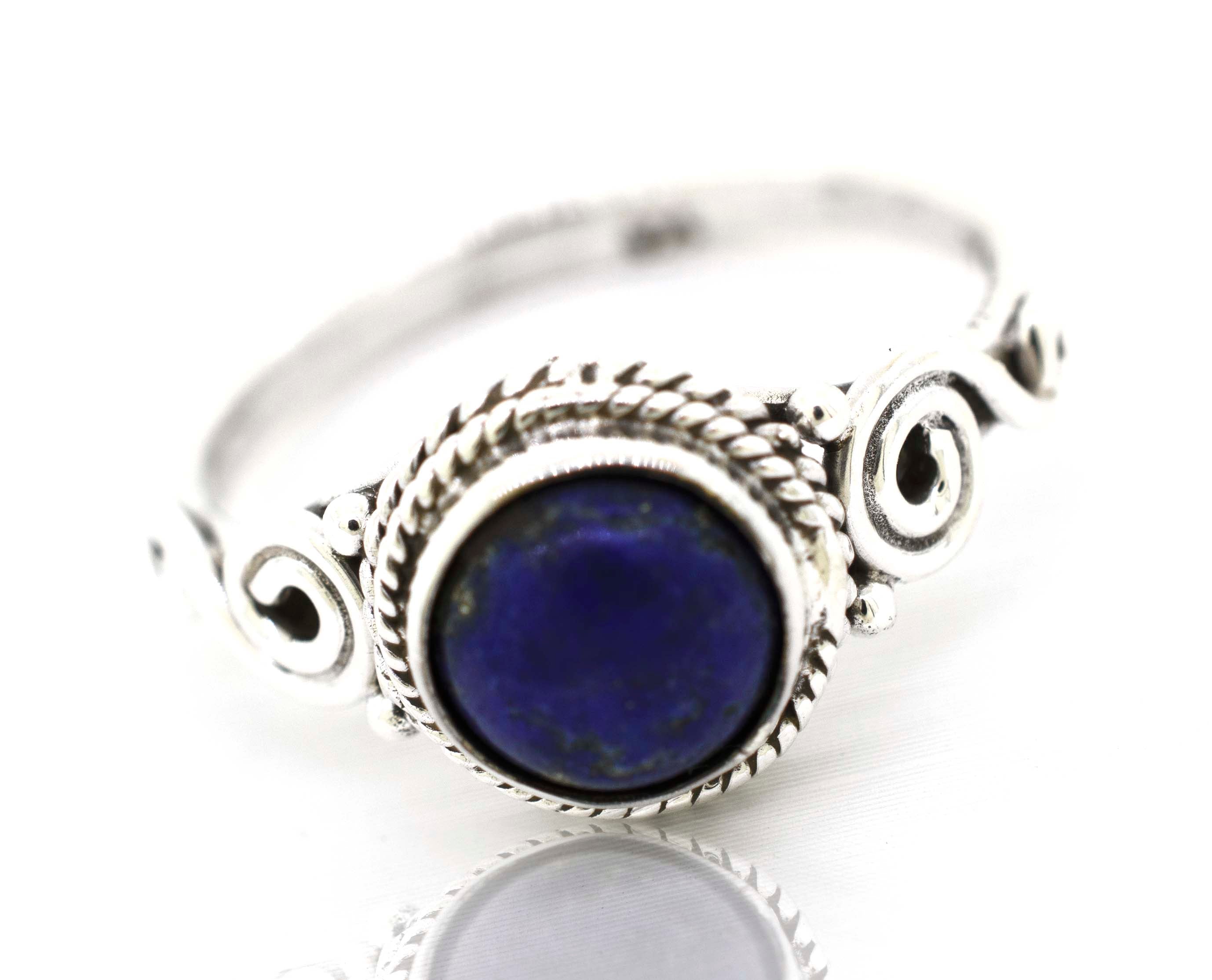 A boho Gemstone Circle Ring With Rope Border And Swirl Design.