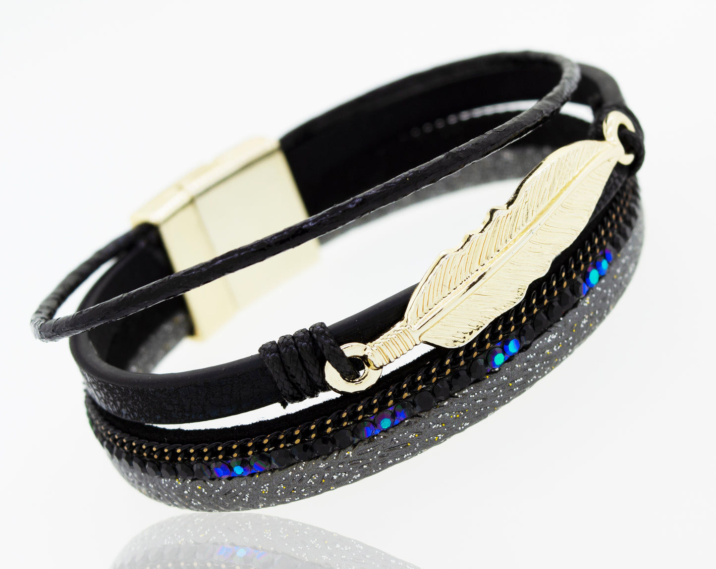 
                  
                    A Super Silver black faux leather bracelet with a gold feather charm.
                  
                