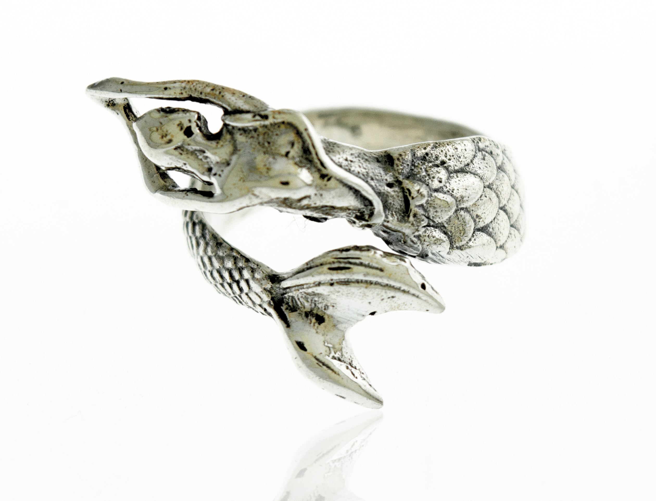 A Sterling Silver Adjustable Mermaid Ring on an ocean surface in Santa Cruz.