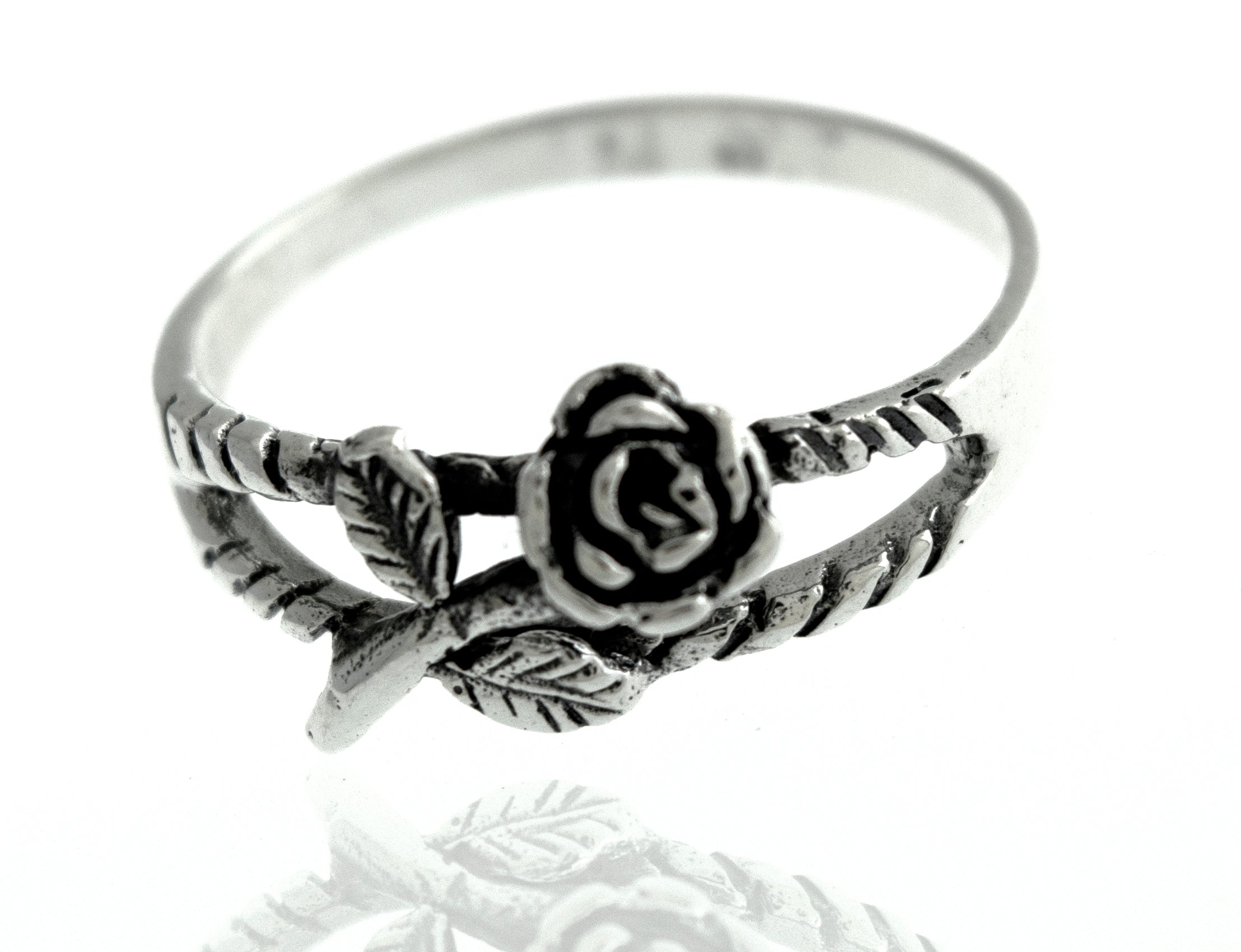 A Sterling Silver Rose Ring with a delicate rose design, inspired by nature's beautiful flowers.