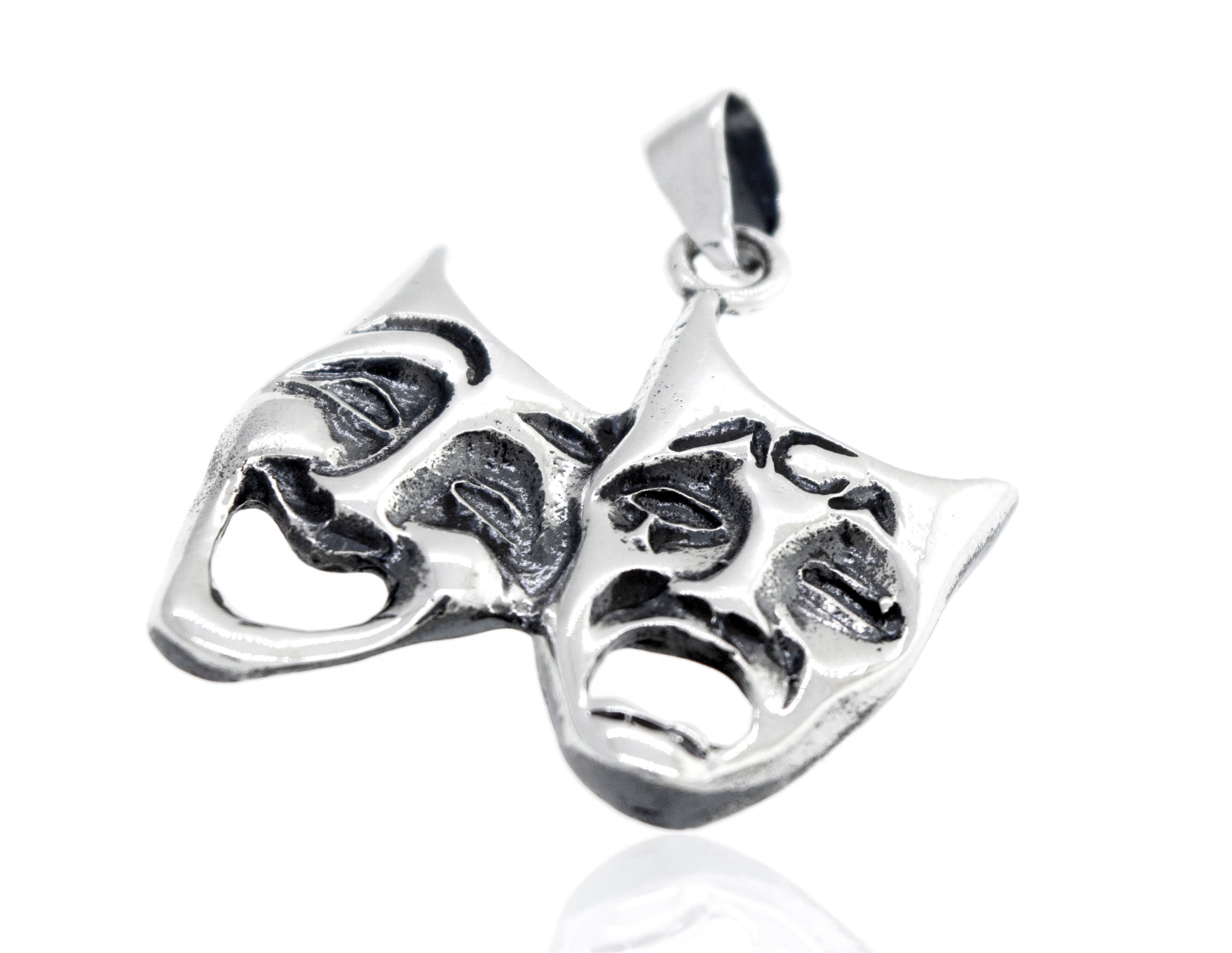 Two Laugh Now Cry Later Pendants by Super Silver on a white background.