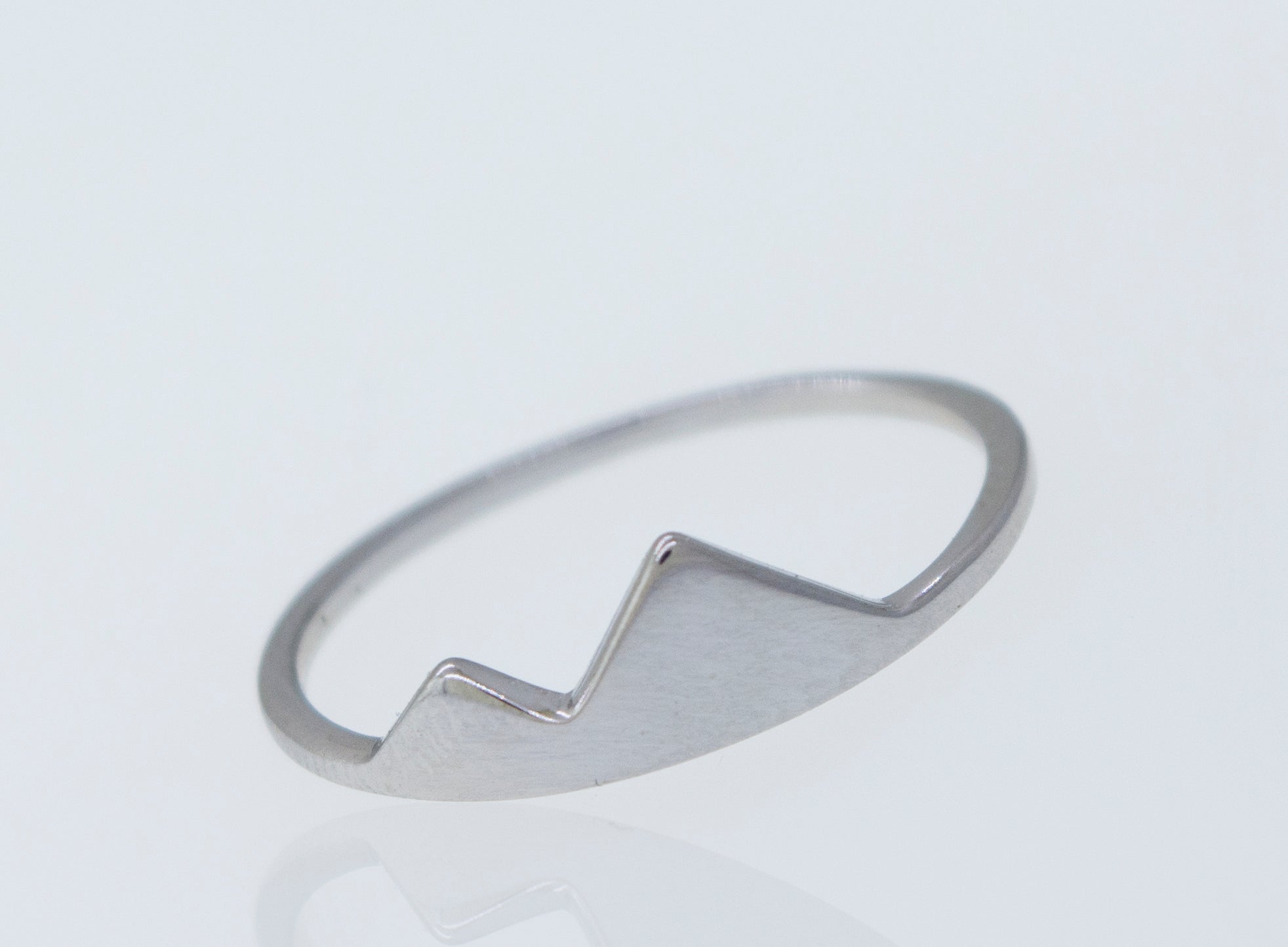 A Super Silver Silver Mountain Ring with a mountain design on it.