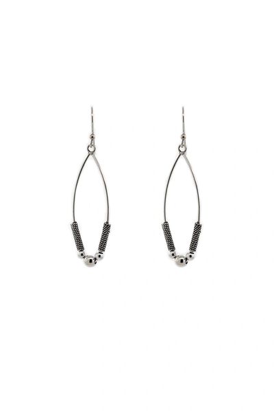 These Super Silver Bali Style Marquise Drop Earrings feature Balinese-style designs with black beads.