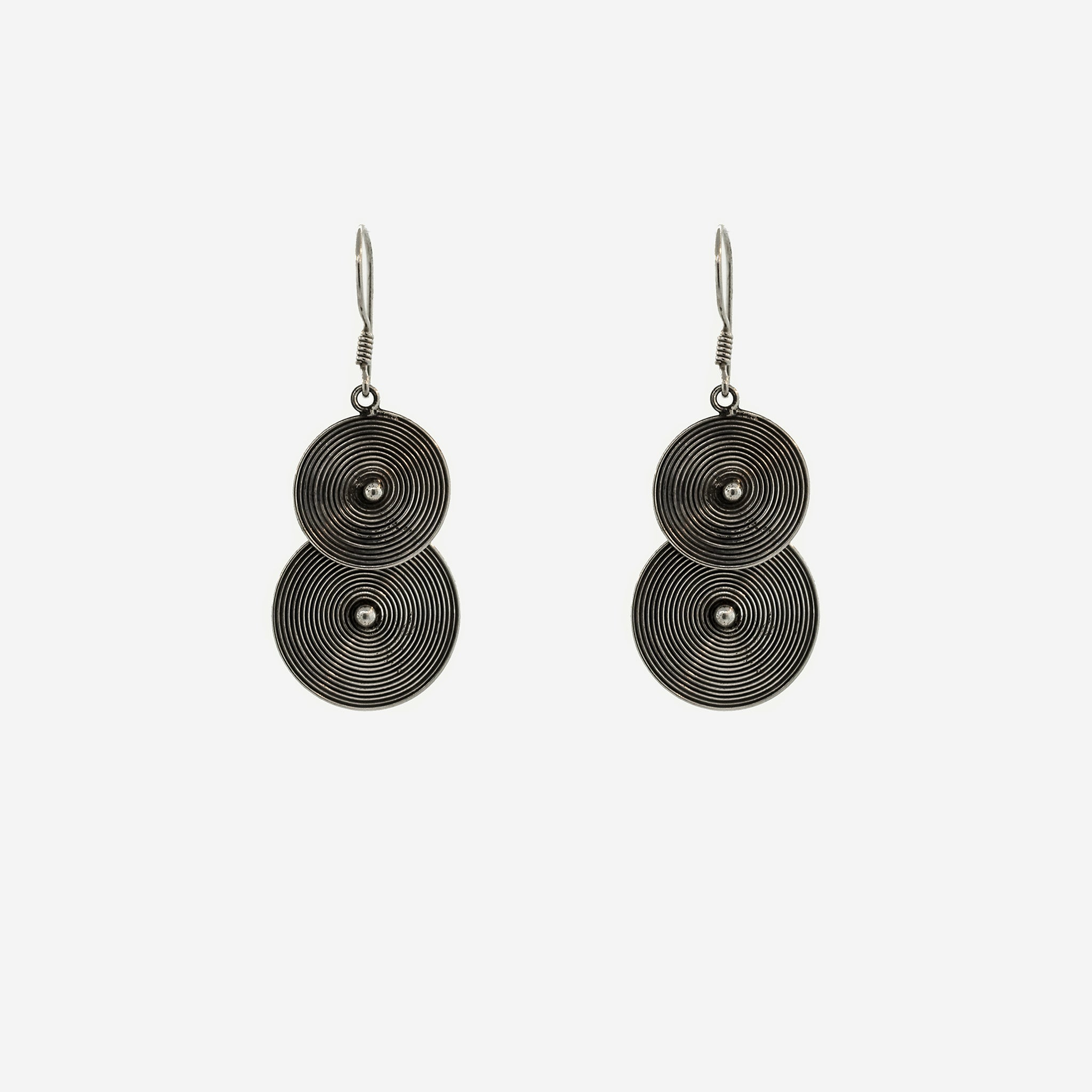 A pair of Super Silver Bali Earrings with Two Spiral Disks on a white background.