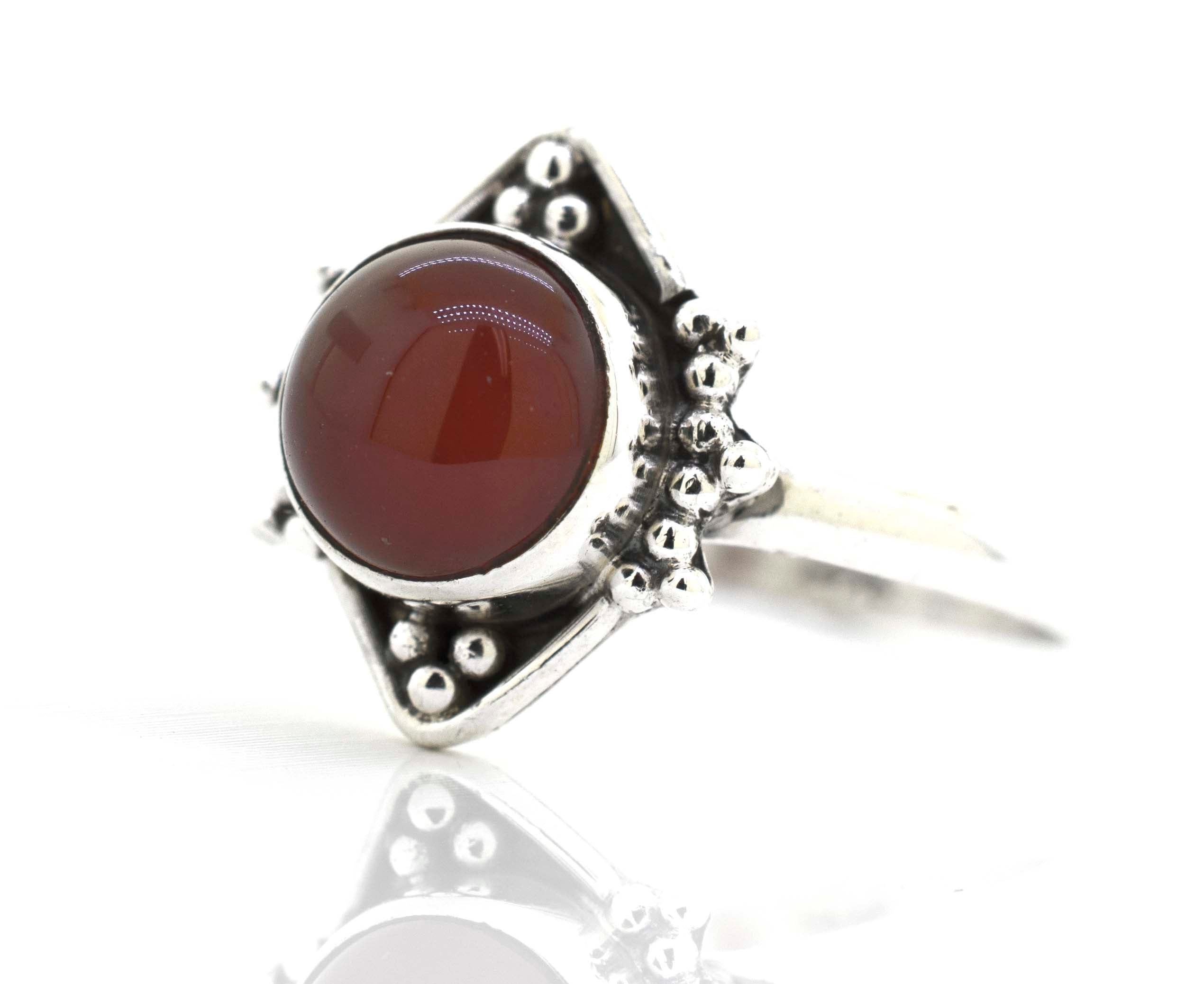 A Round Gemstone Ring With Oxidized Diamond Shape Pattern from Super Silver.