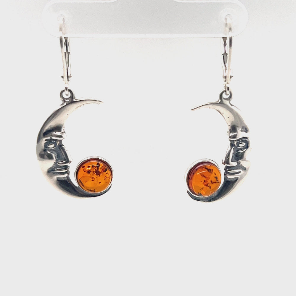 
                  
                    Load and play video in Gallery viewer, Amber Man-in-the-Moon Earrings
                  
                