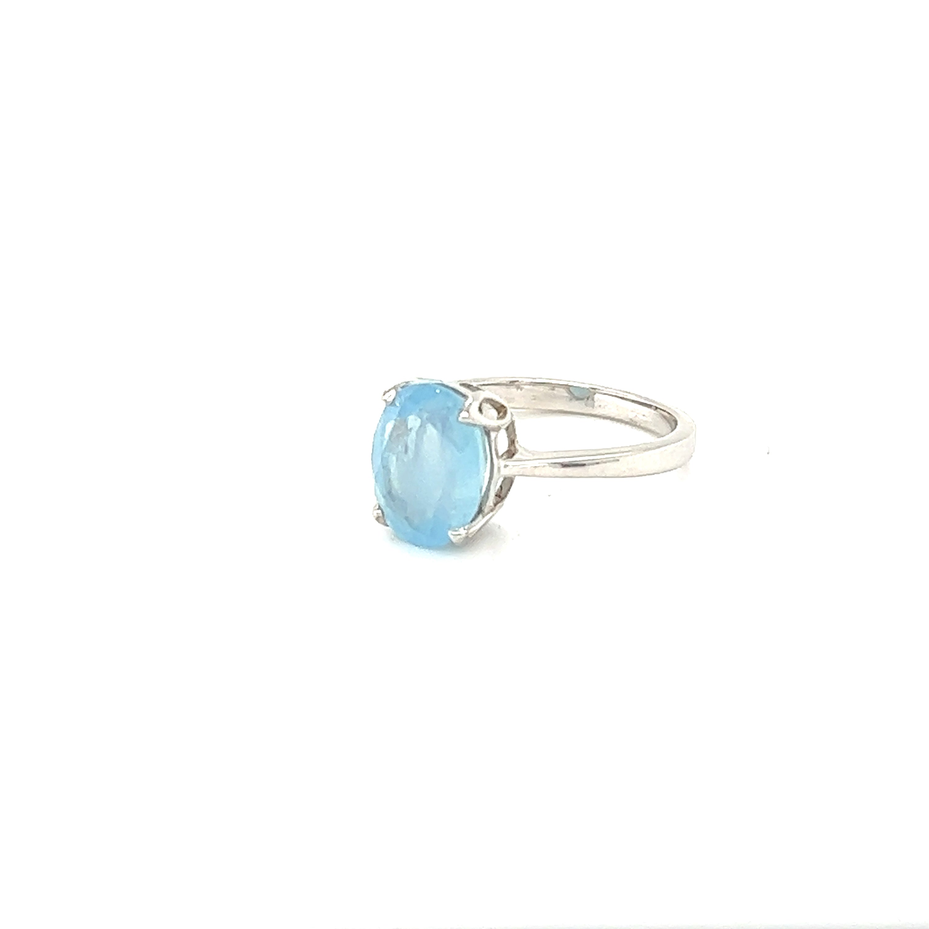 A Super Silver Aquamarine Ring with an aquamarine stone on a white background.