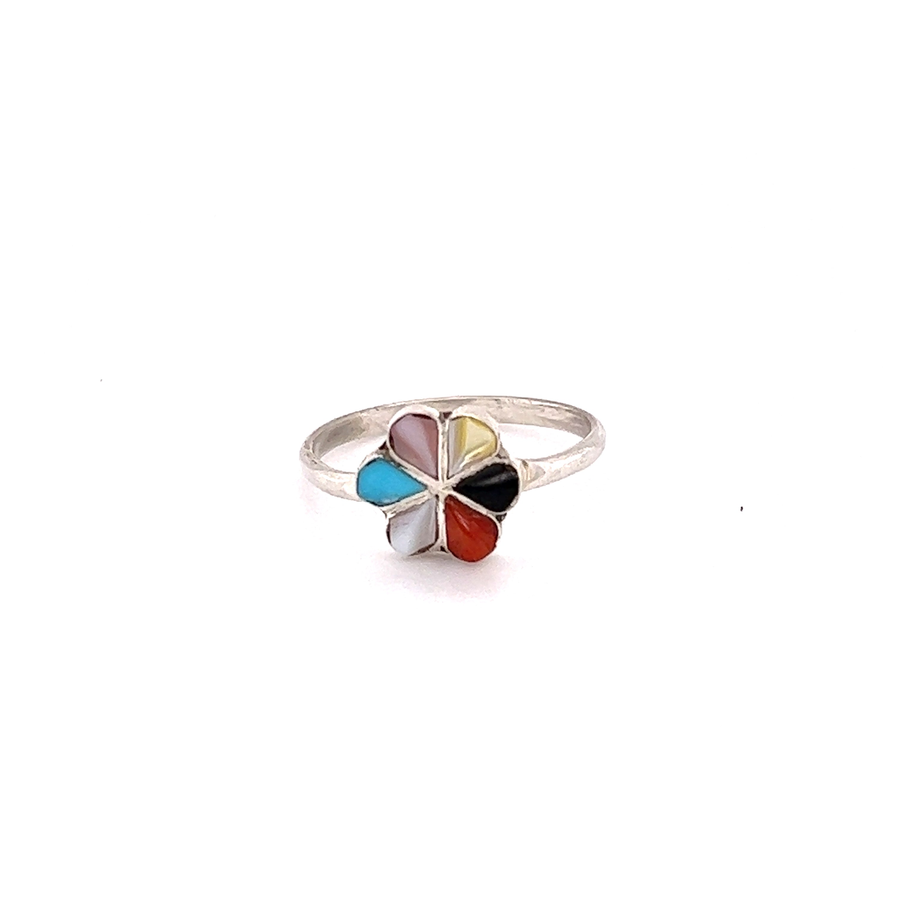 A Zuni Handmade Multi Stone ring with colorful stones inspired by native cultures.
