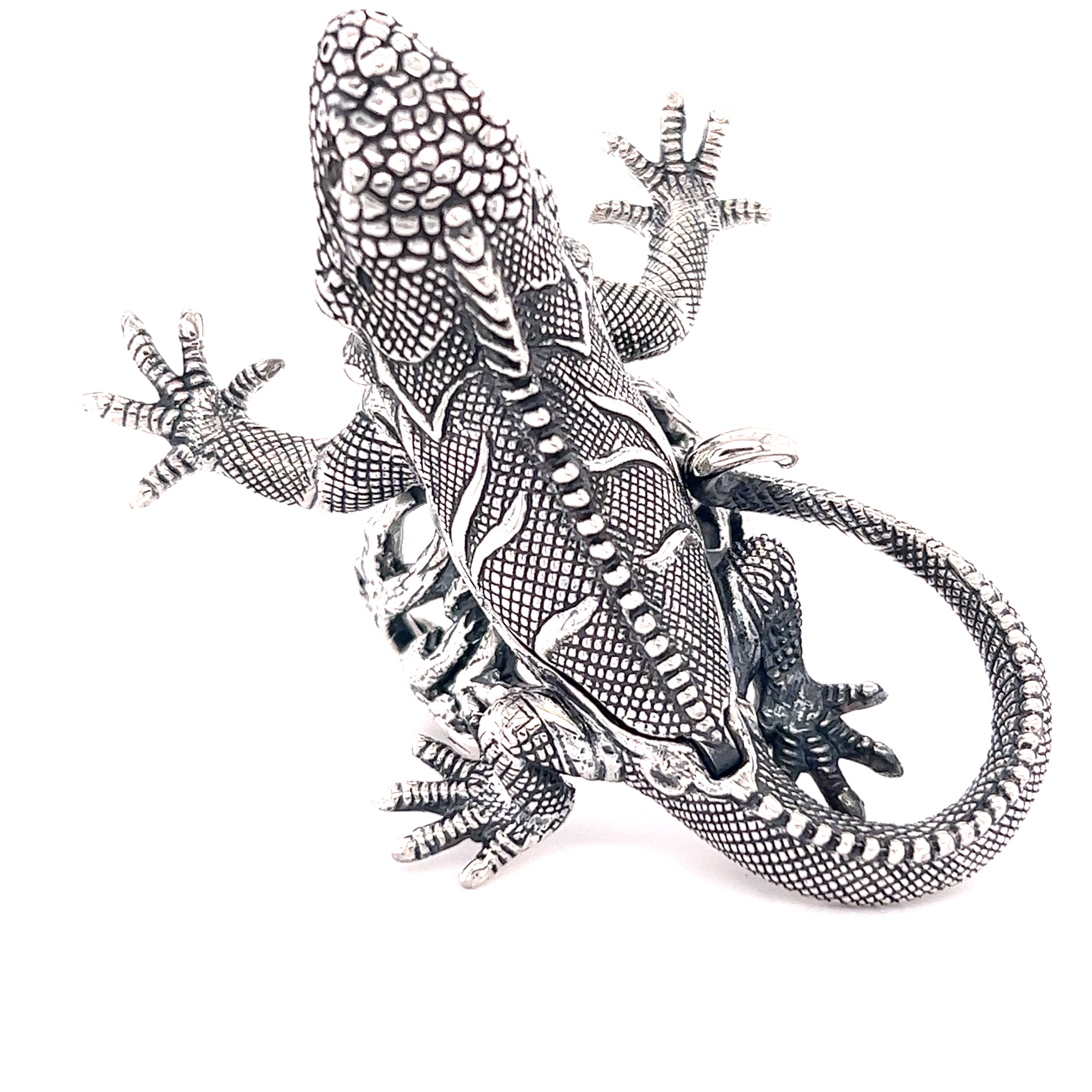 An artisan Handcrafted Iguana Ring on a white background.