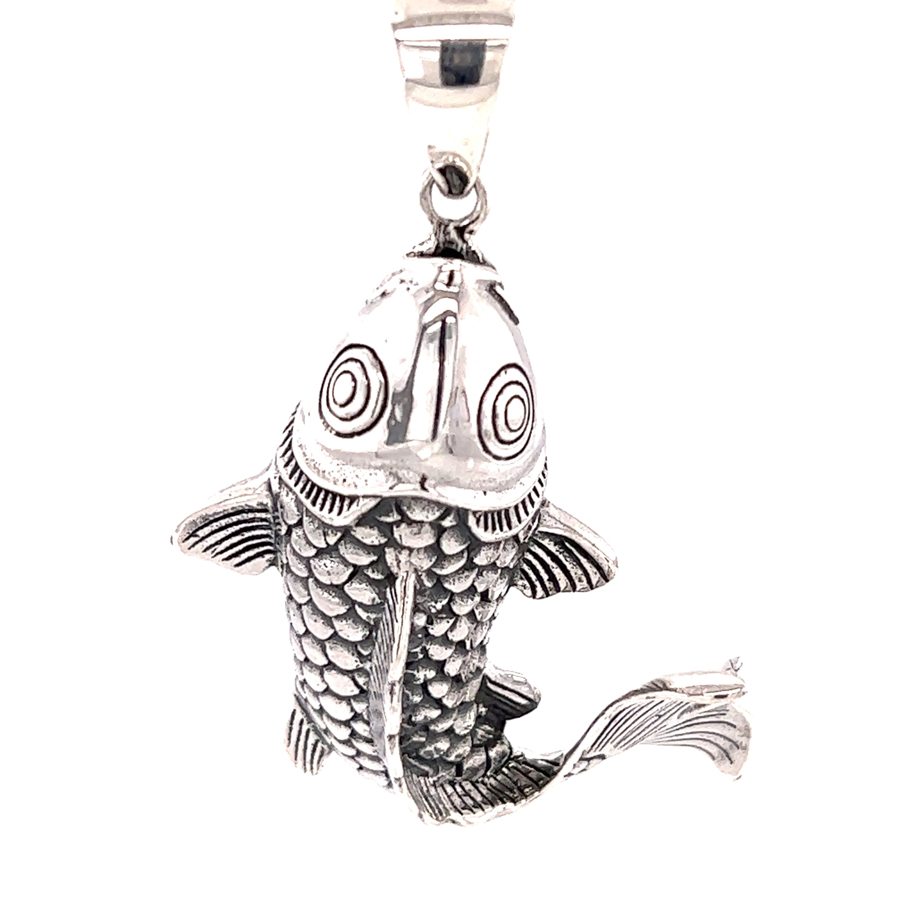 A Super Silver Handcrafted Koi Fish Pendant on a white background.