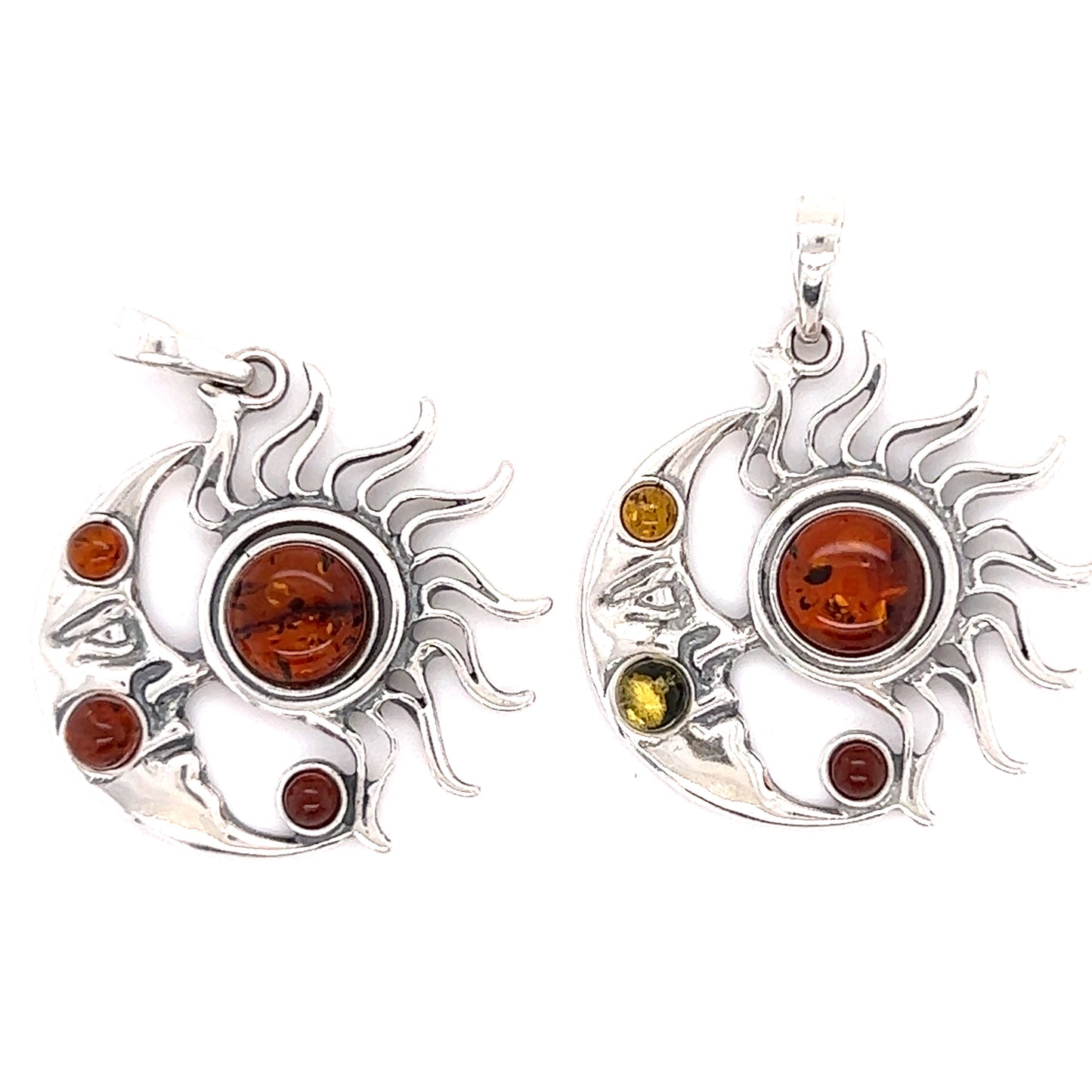 A pair of Magical Sun and Moon Amber Pendant earrings by Super Silver, featuring healing properties.
