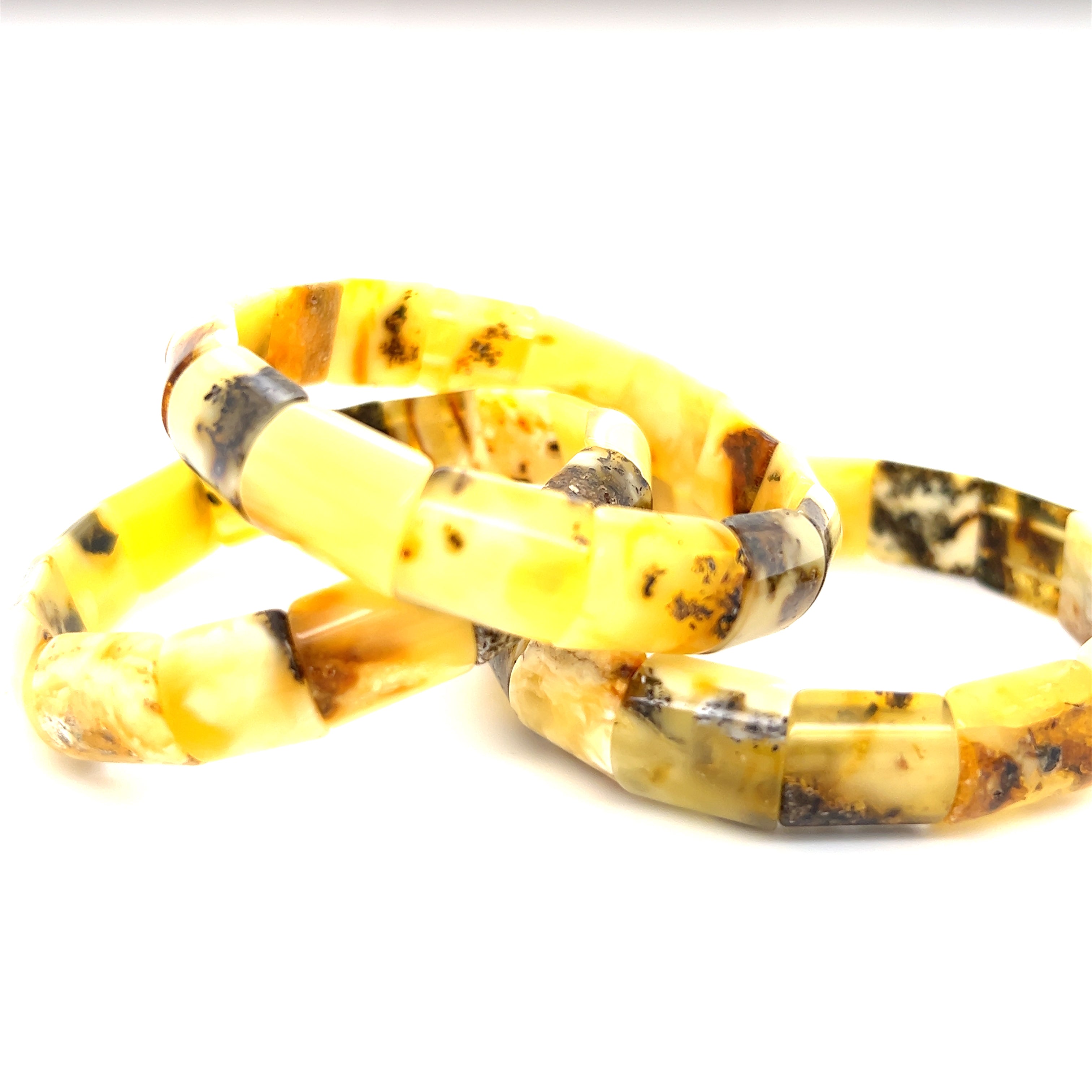 Super Silver's Brilliant Butterscotch Amber Stretch Bracelet, renowned for its healing properties, is beautifully crafted with butterscotch beads. These bracelets, also known as Baltic amber bracelets, offer a holistic approach to wellness.