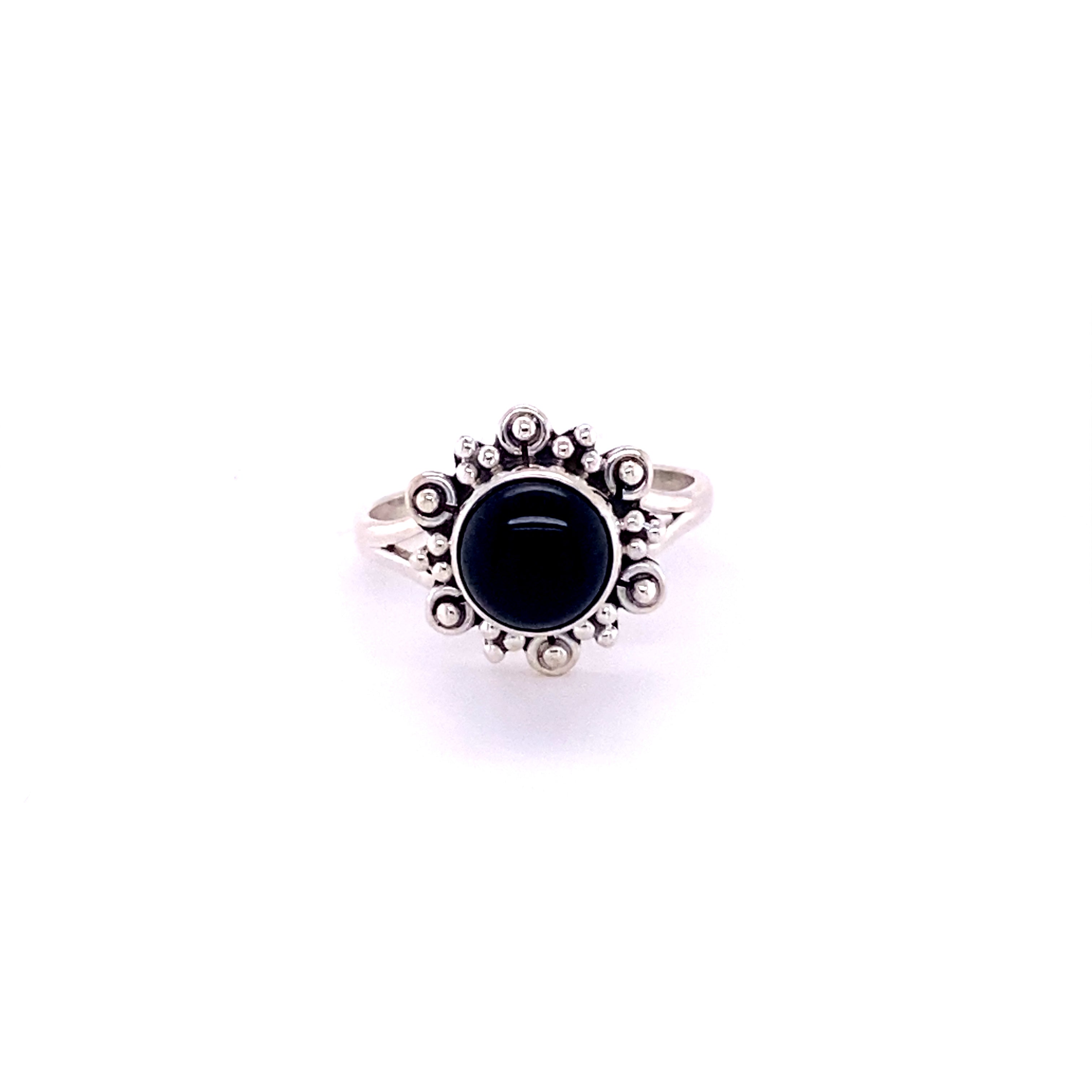 A Super Silver Beautiful Round Flower Ring with Natural Gemstones with a cabochon black stone in the center.