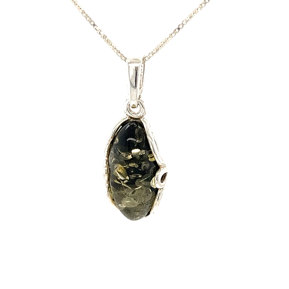 
                  
                    A Charming Oval Amber Pendant with a sparkling black stone on a Super Silver chain.
                  
                