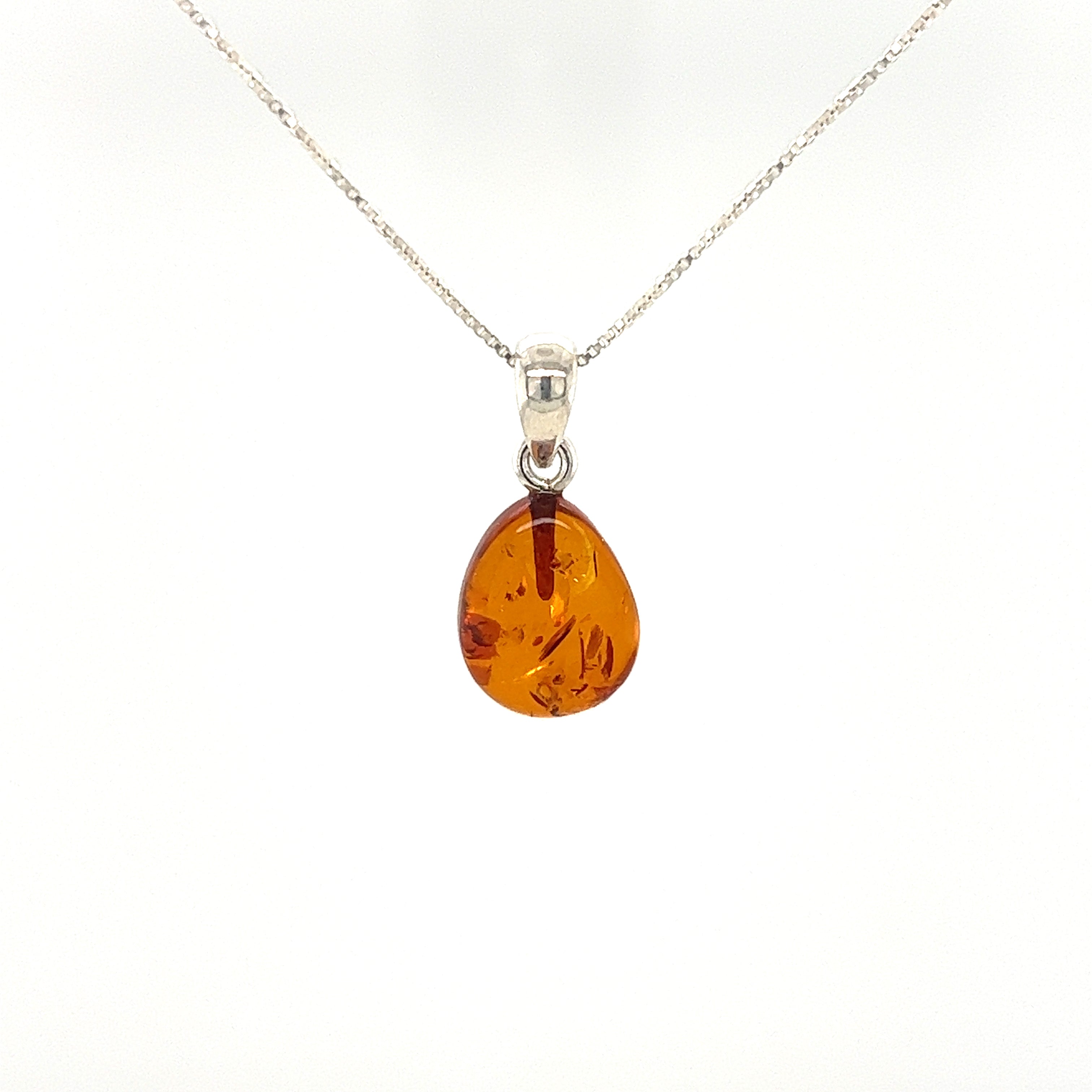 Super Silver's Teardrop Amber Pendant, with a minimalist look, in sterling silver.