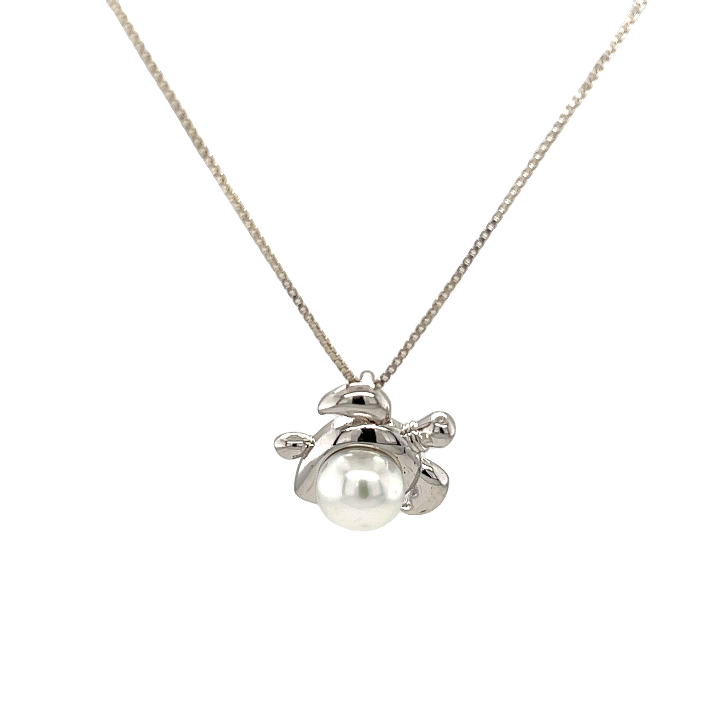 A Charming Pearl Sea Turtle Pendant embellished with a white shell pearl accent, perfect for ocean enthusiasts from Super Silver.