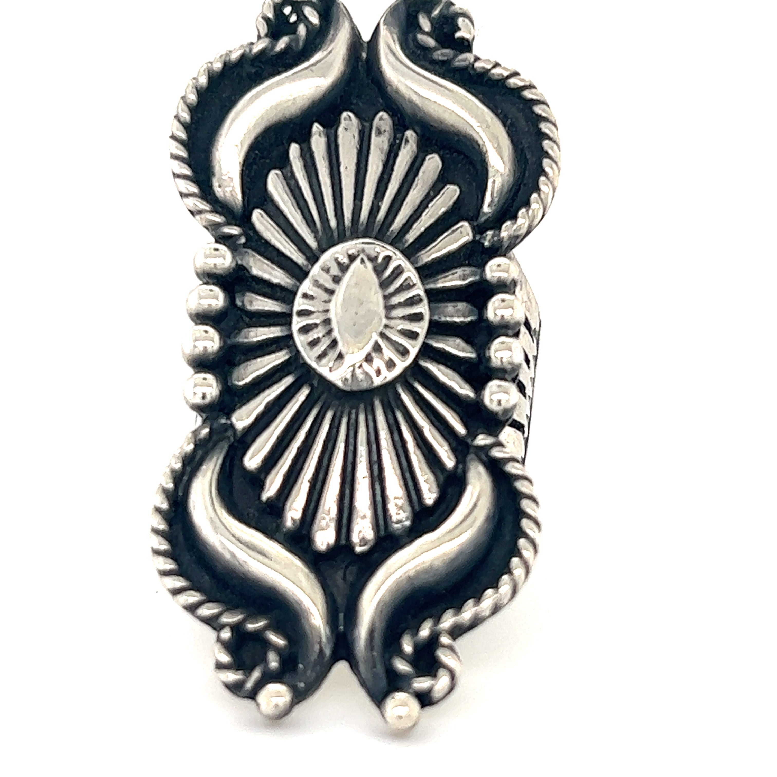 An Extravagant Native American Shield Ring by Super Silver, with a sunburst design, inspired by southwest culture and Native American rings. Perfect for tribal members seeking a unique piece of jewelry.