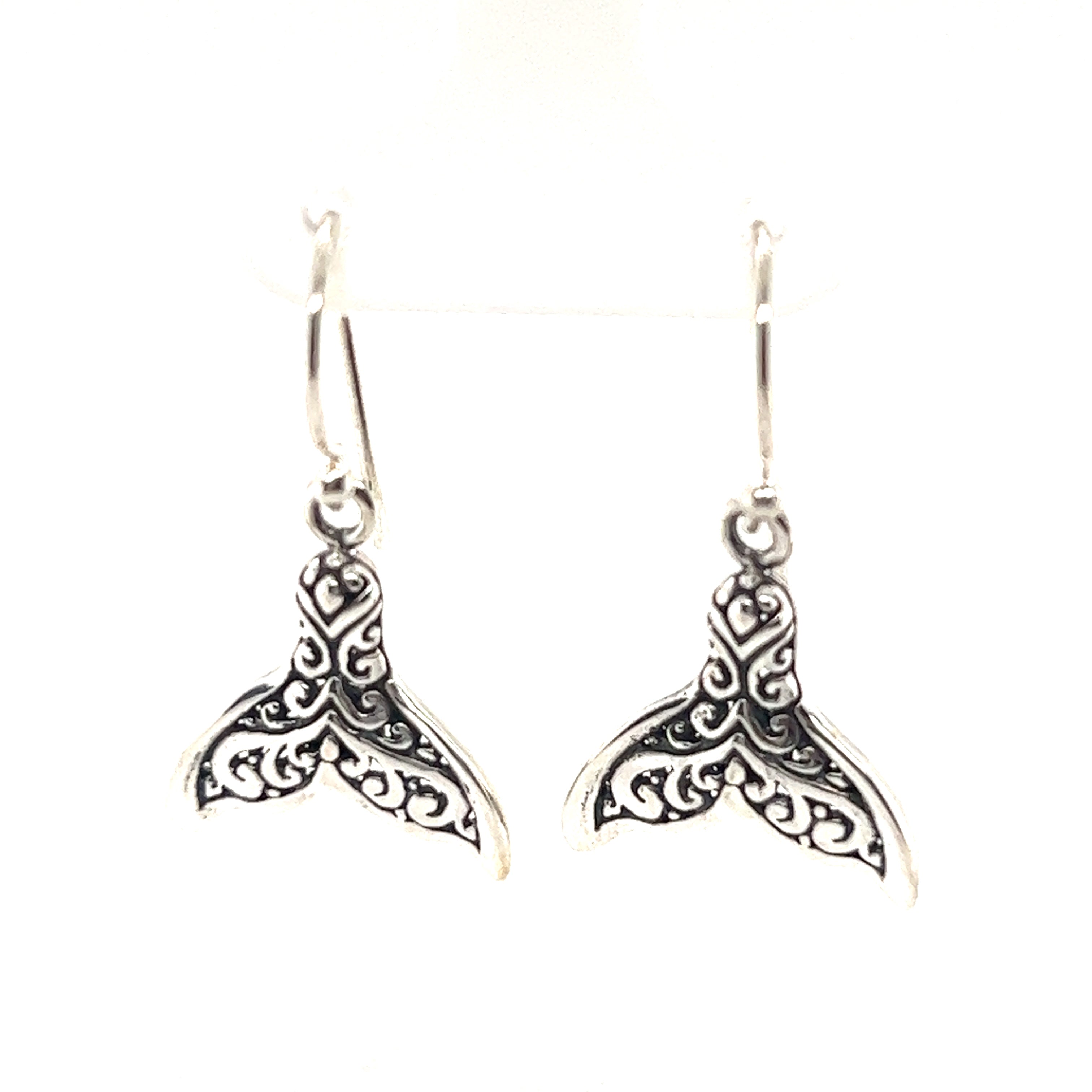 A pair of Super Silver's Enchanting Filigree Whale Tail Earrings.