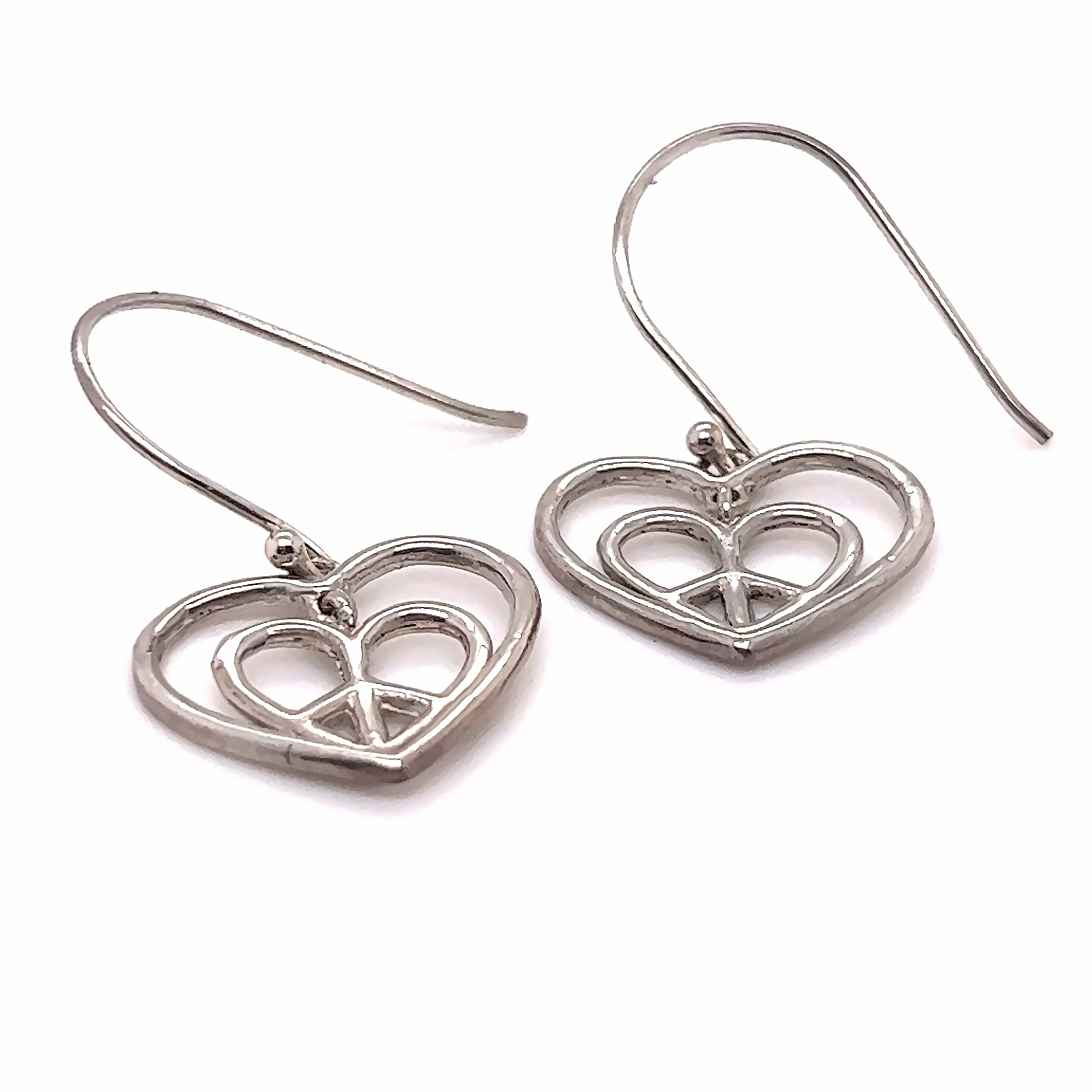 Super Silver's Hearts With Peace Signs Earrings made of .925 silver on a white background.