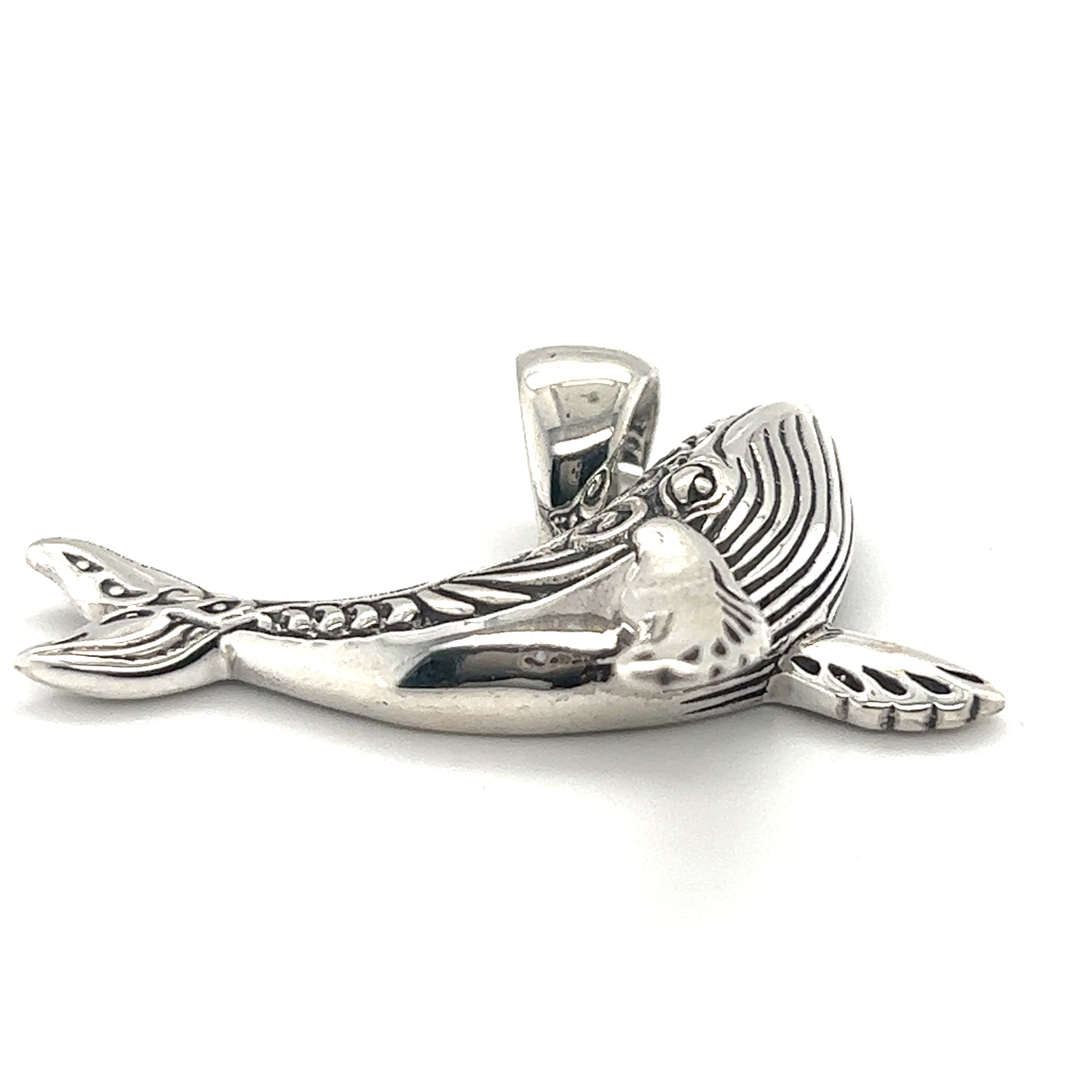 A Super Silver Stunning Whale Pendant on a white background.