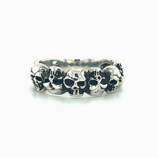 A gothic Alternating Skull Ring with Adjacent Skeleton Hands adorned with skull motifs.
