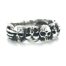 A gothic Alternating Skull Ring with Adjacent Skeleton Hands adorned with four skulls.