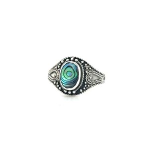 An oxidized silver Vintage Style Oval Shield Ring with inlaid blue and green stones.