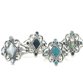 A group of Victorian Style Inlay Rings adorned with intricate inlay designs.