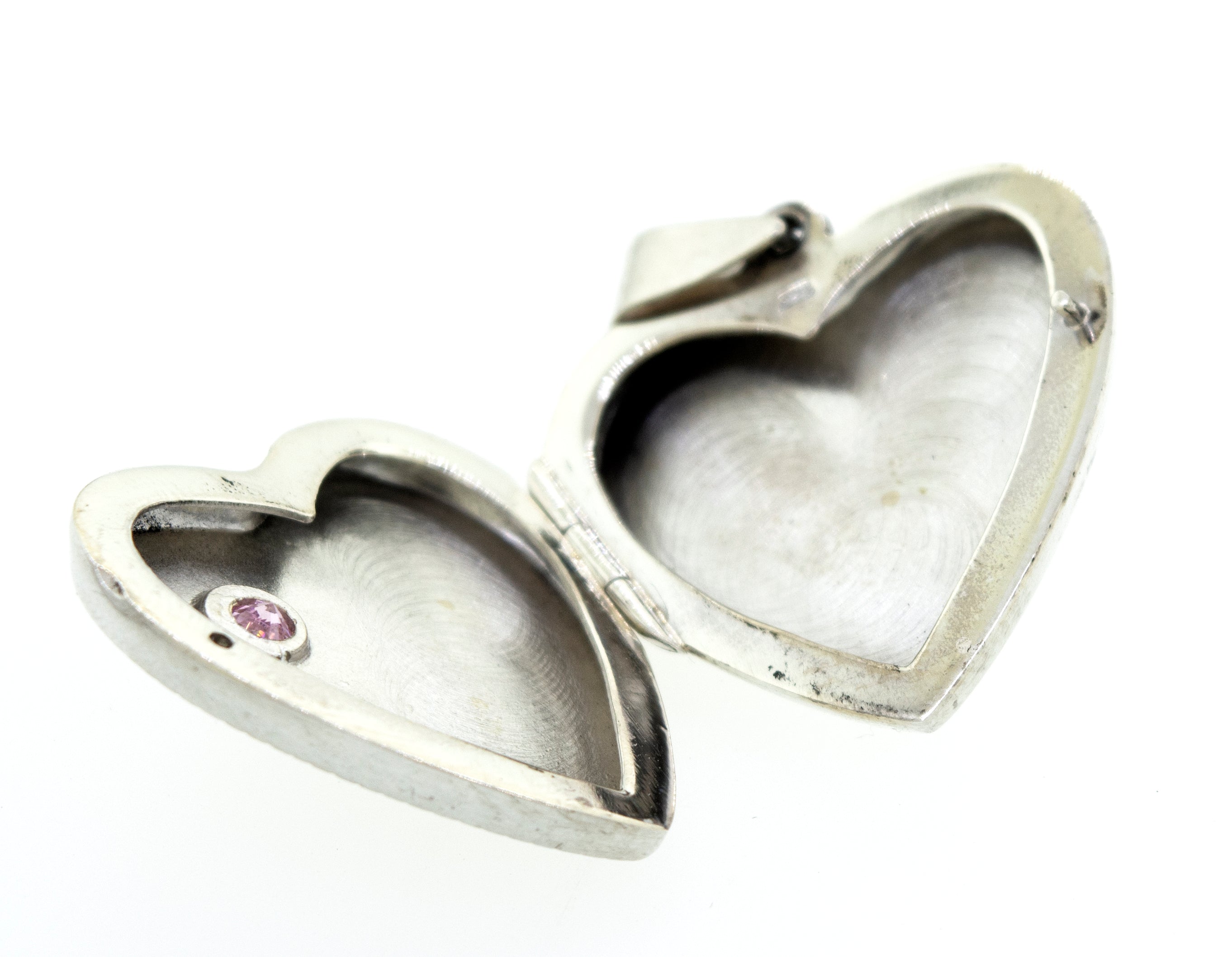 A Super Silver heart-shaped locket with a romantic charm.