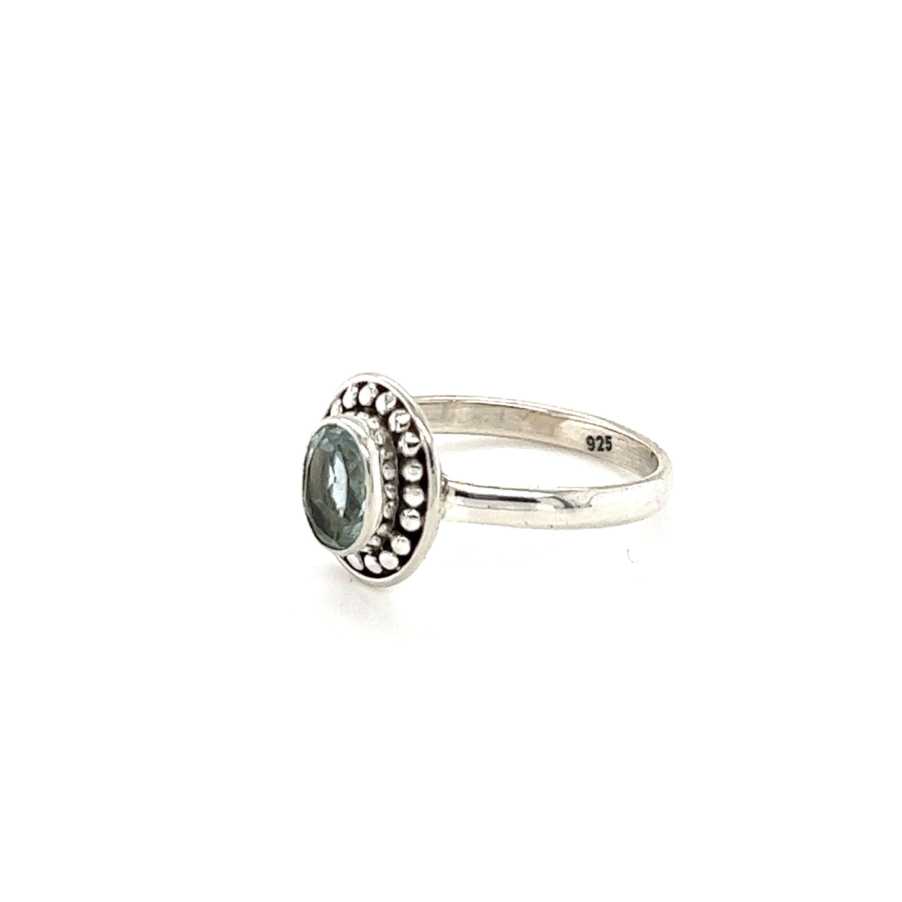 An Oval Gemstone Ring with Ball Disk Border, perfect for the hippie at heart in Santa Cruz.