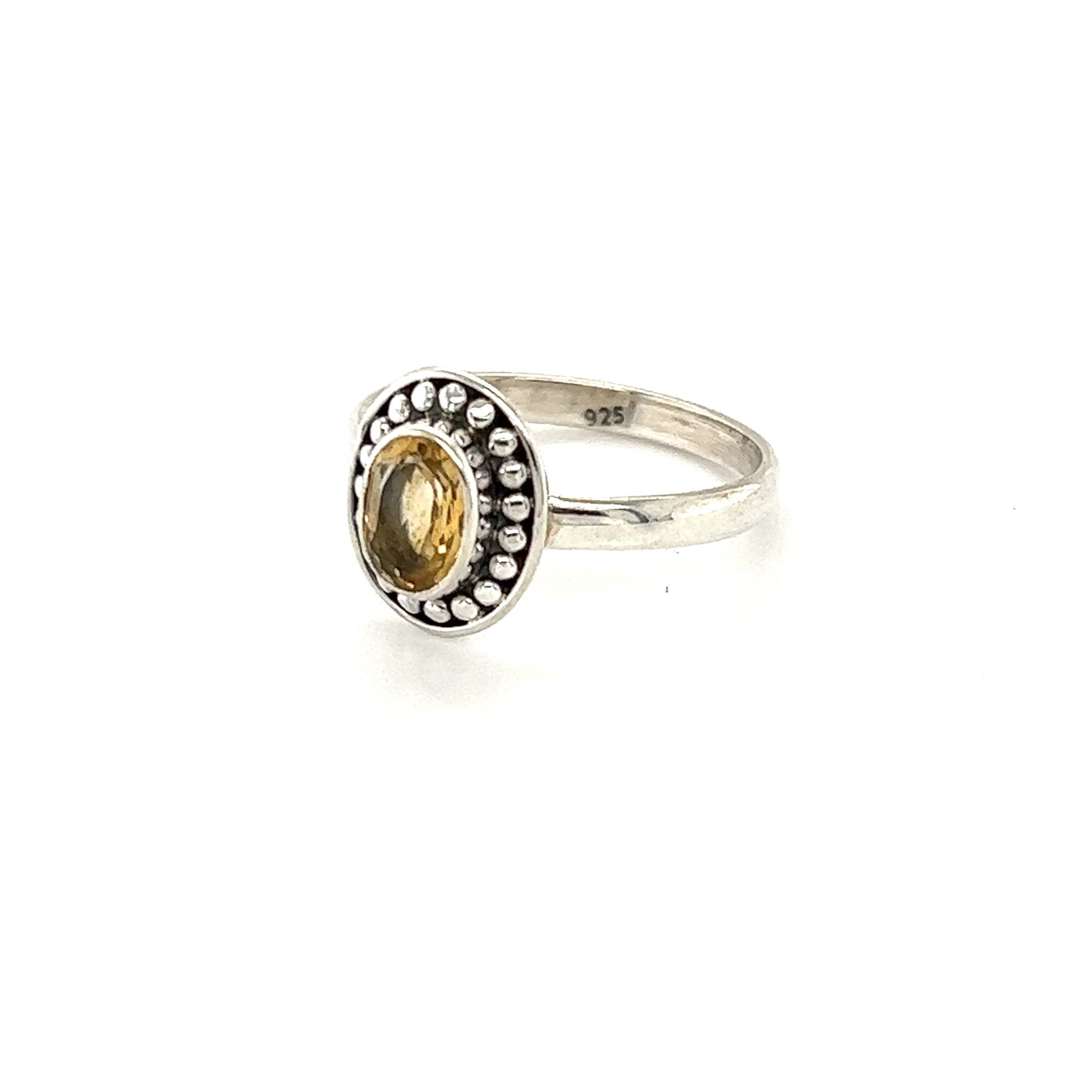 An Oval Gemstone Ring with Ball Disk Border made by Super Silver.