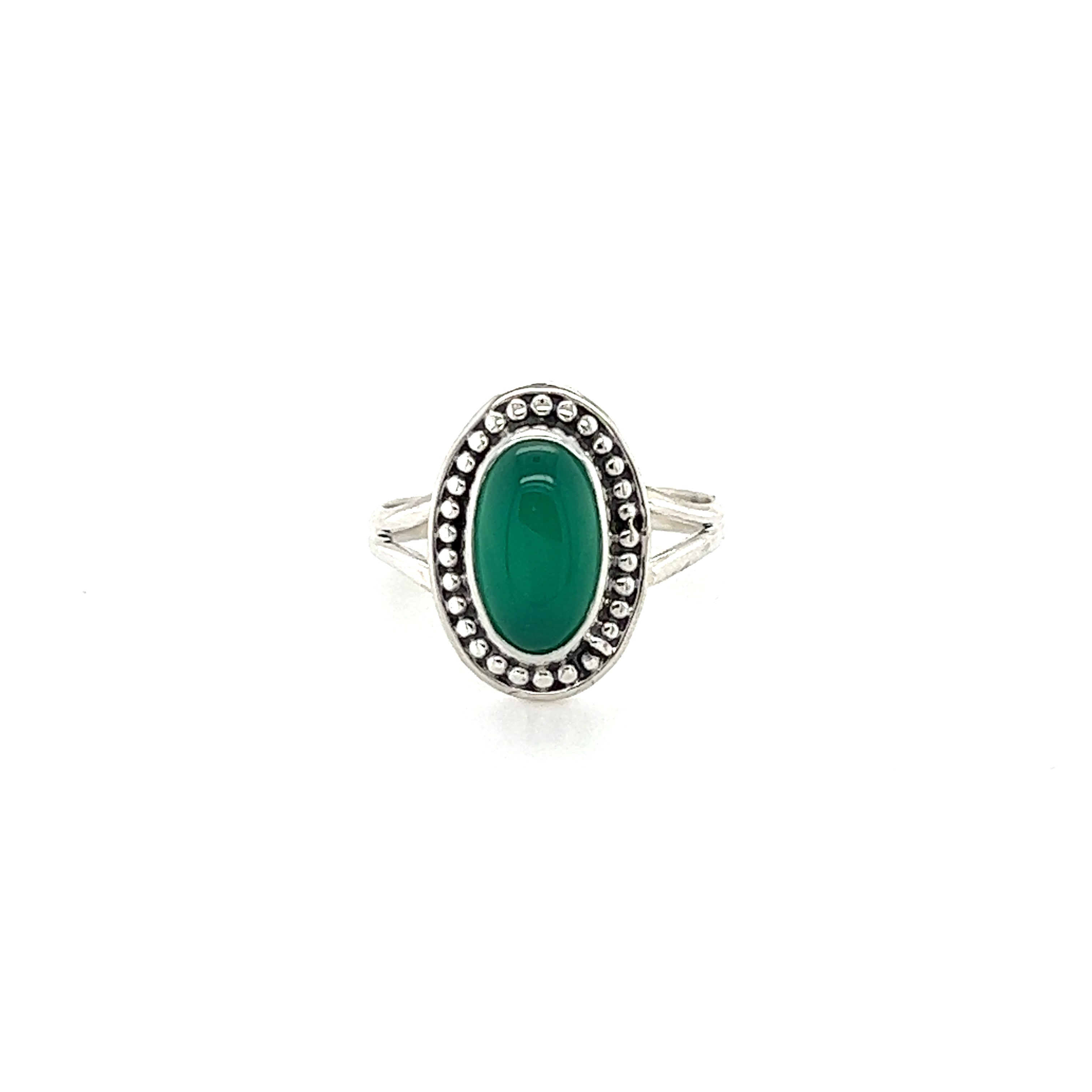 A Trendy Oval Ring from Super Silver with an oval green stone.