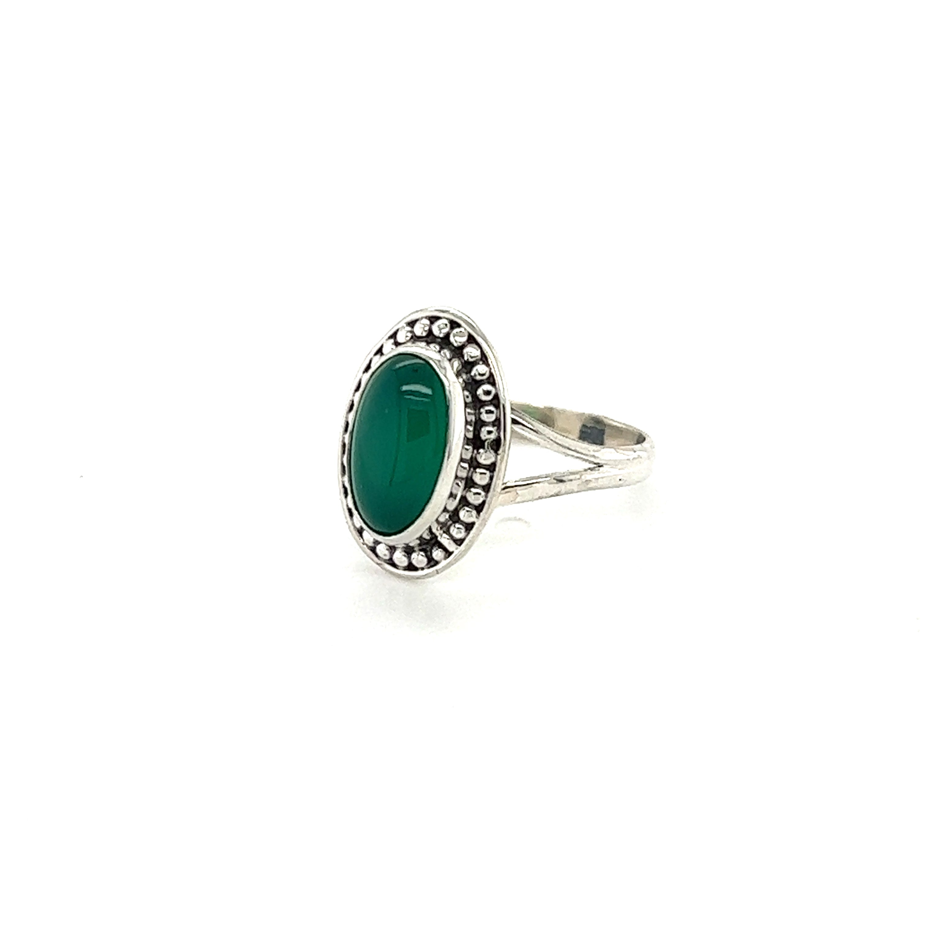 A Super Silver Trendy Oval Ring with an oval green stone, made of .925 Sterling Silver.