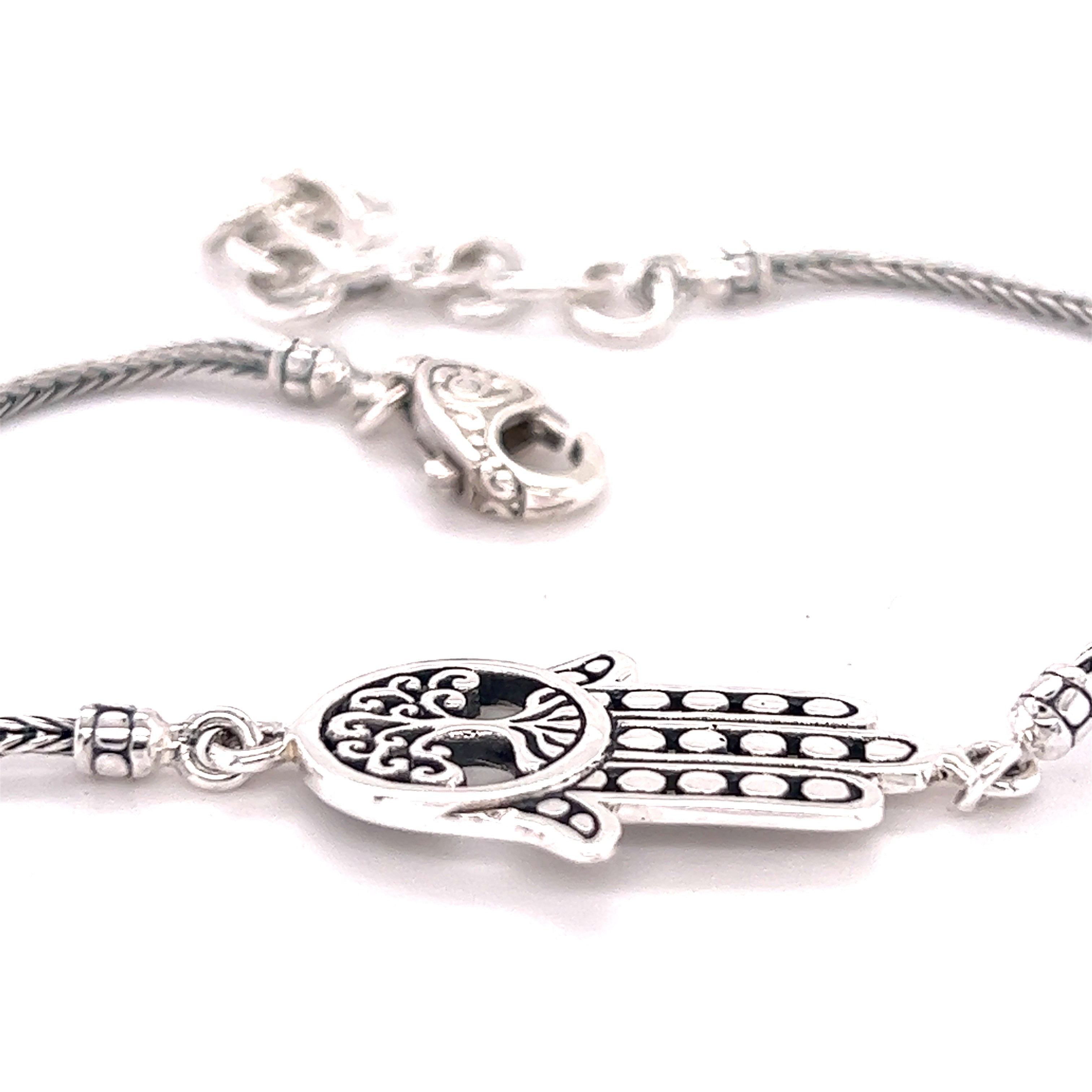 An Super Silver Hamsa with Tree of Life Bracelet, perfect for everyday wear.